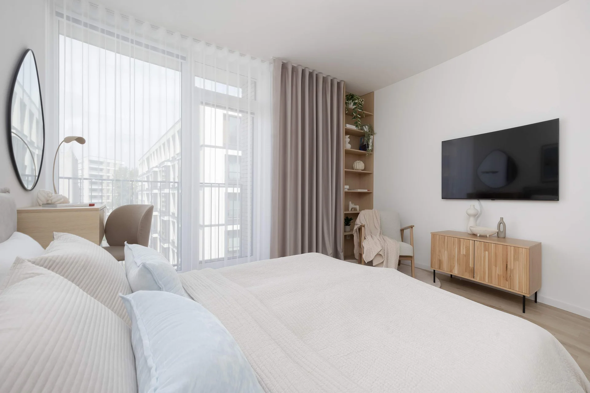 Stylish studio with TV area and soft neutral decor