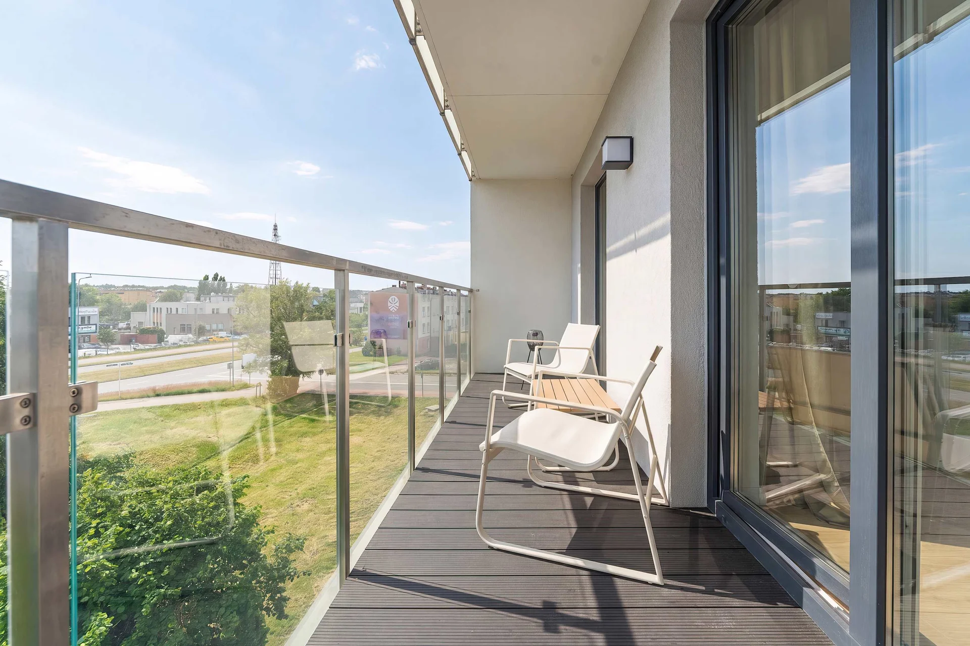 The balcony provides a perfect spot for enjoying the fresh air.