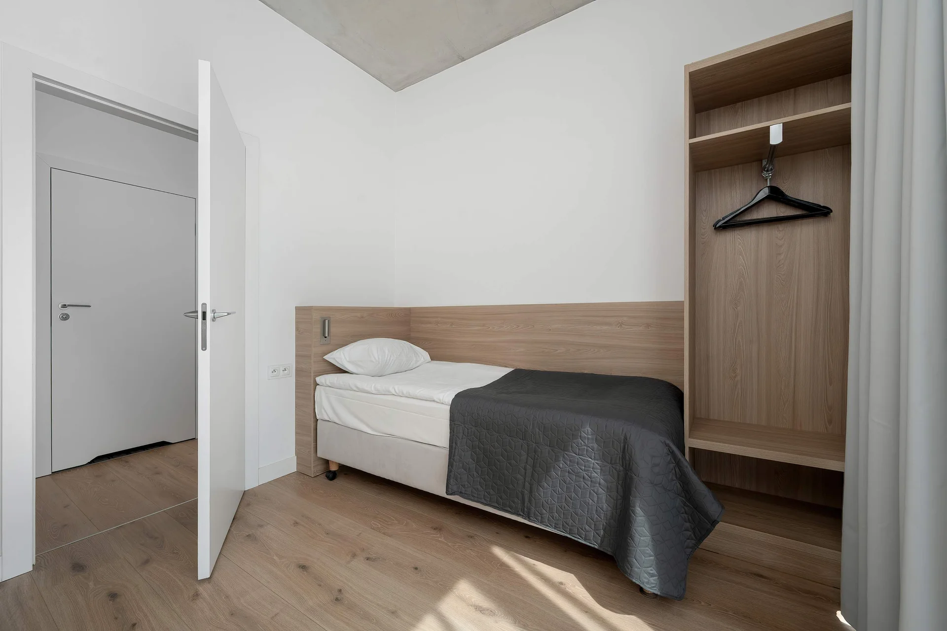 The bedroom's elegant decor creates a serene and restful environment.