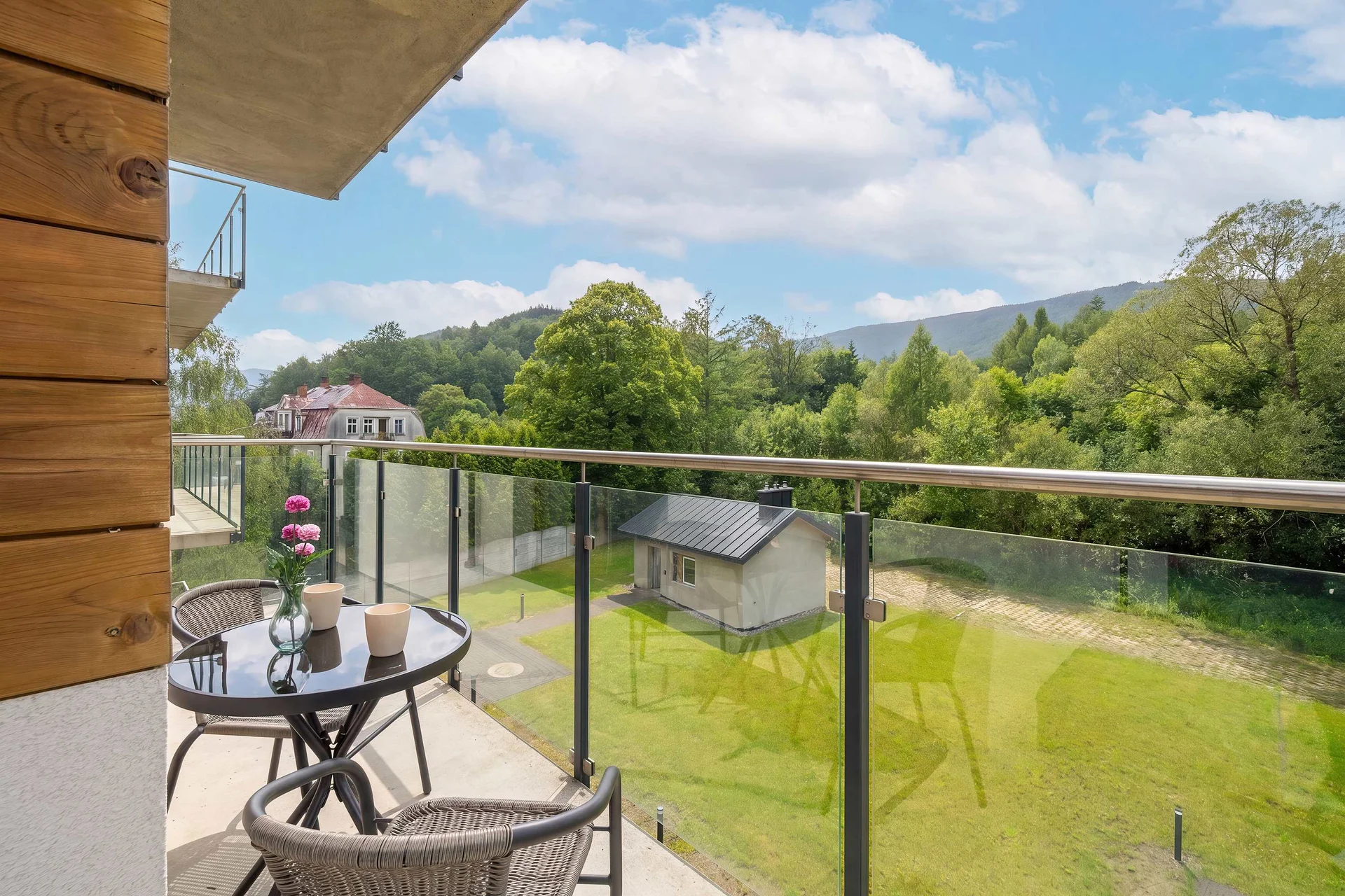 The balcony provides a serene environment for relaxation.
