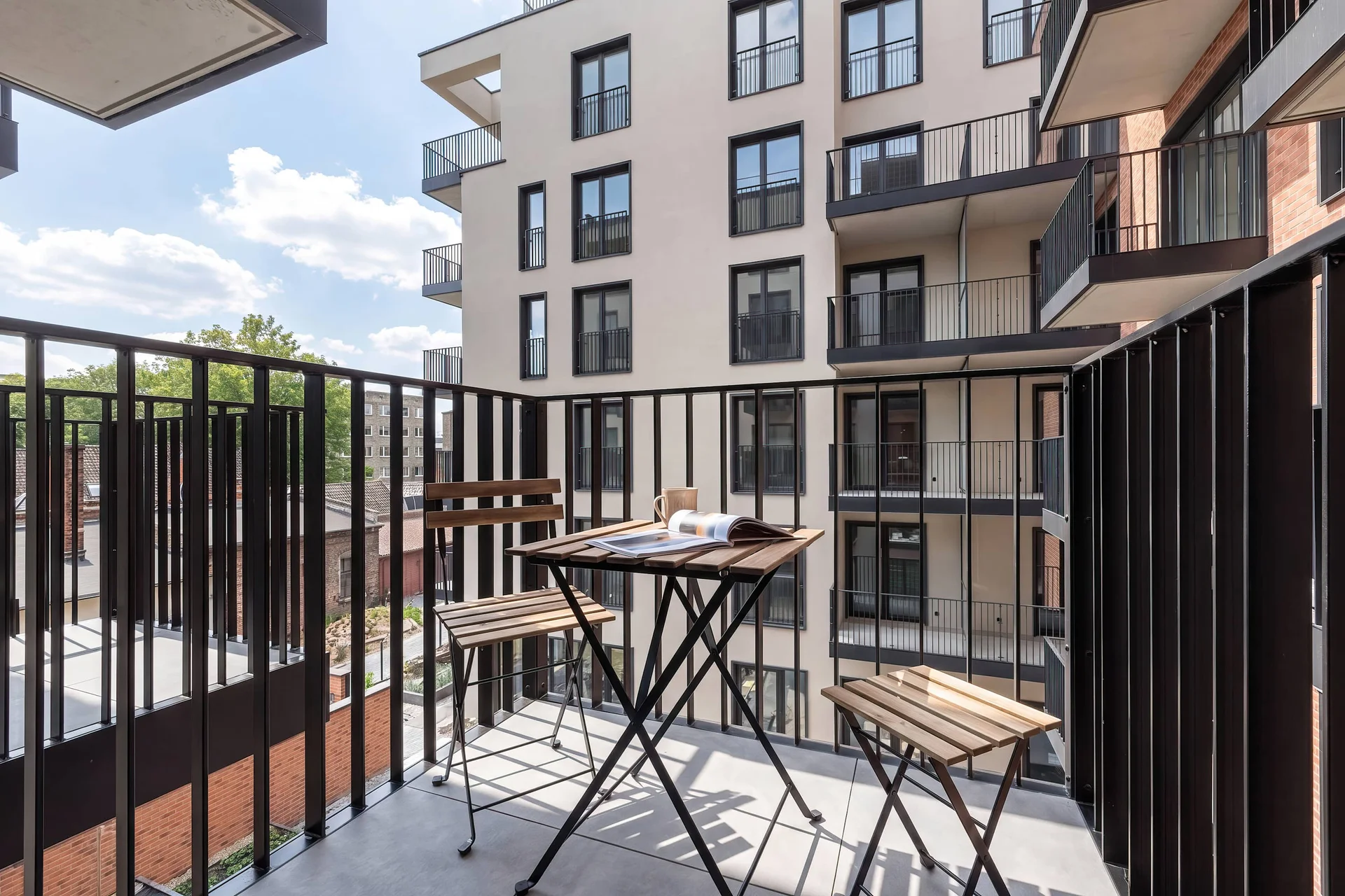 The balcony provides a perfect spot for enjoying the fresh air.