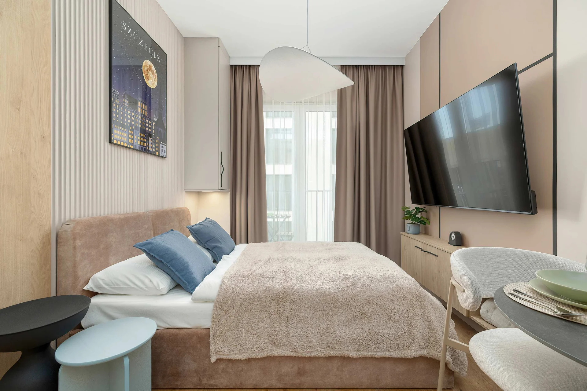 The living area has a modern look and comfortable furniture.