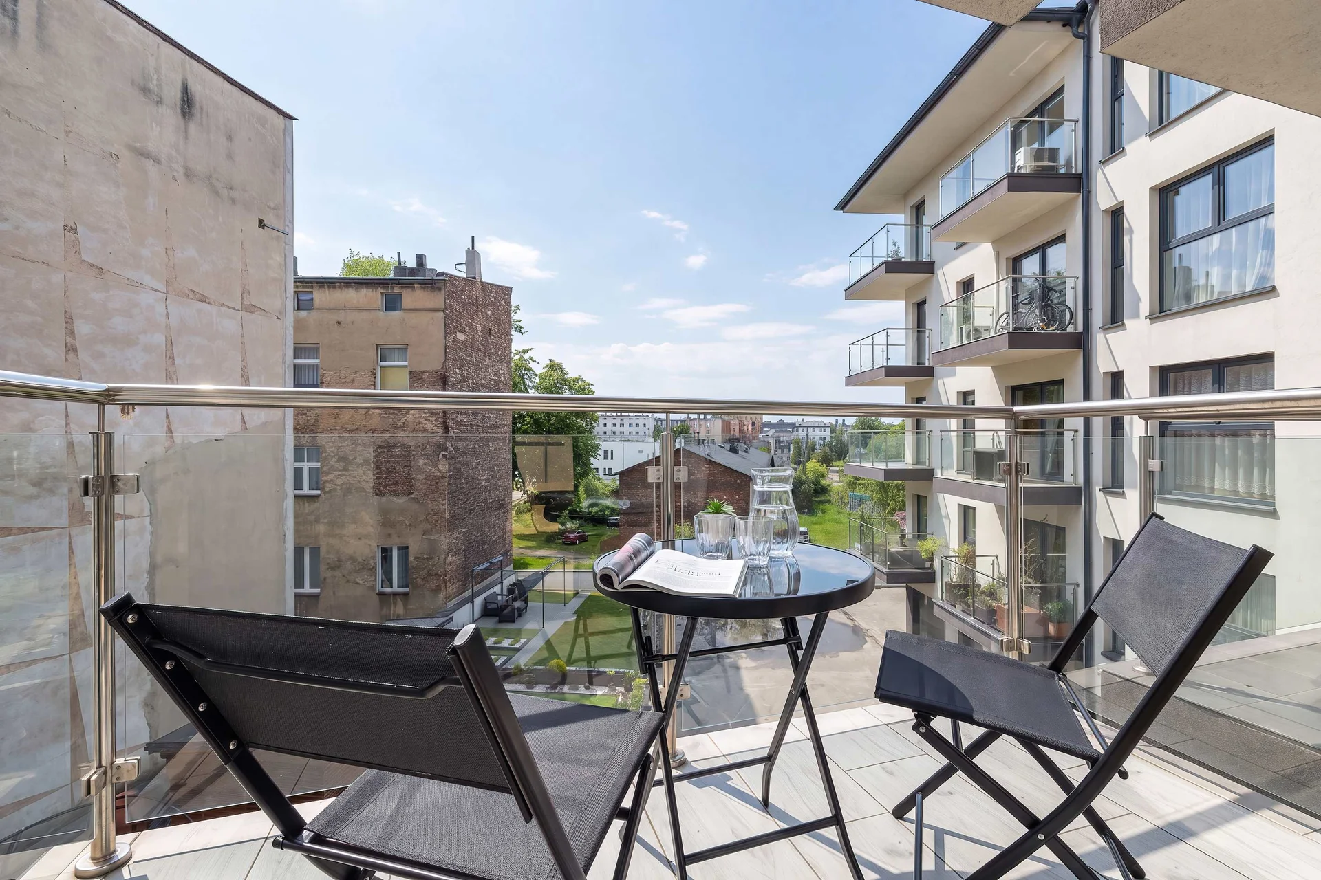 The balcony provides a perfect spot for enjoying the fresh air.