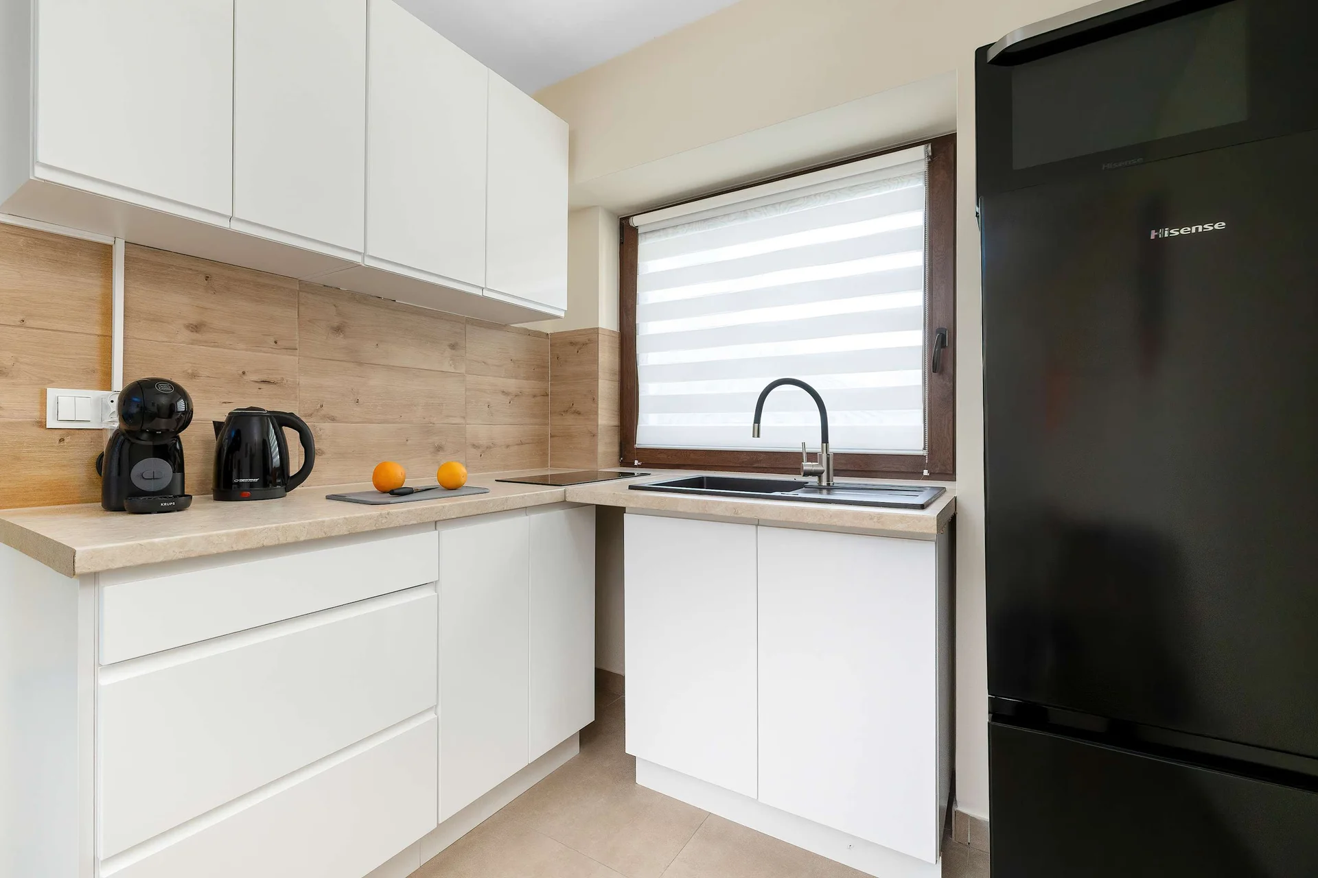 The fully equipped kitchenette includes everything you need for a home-cooked meal.
