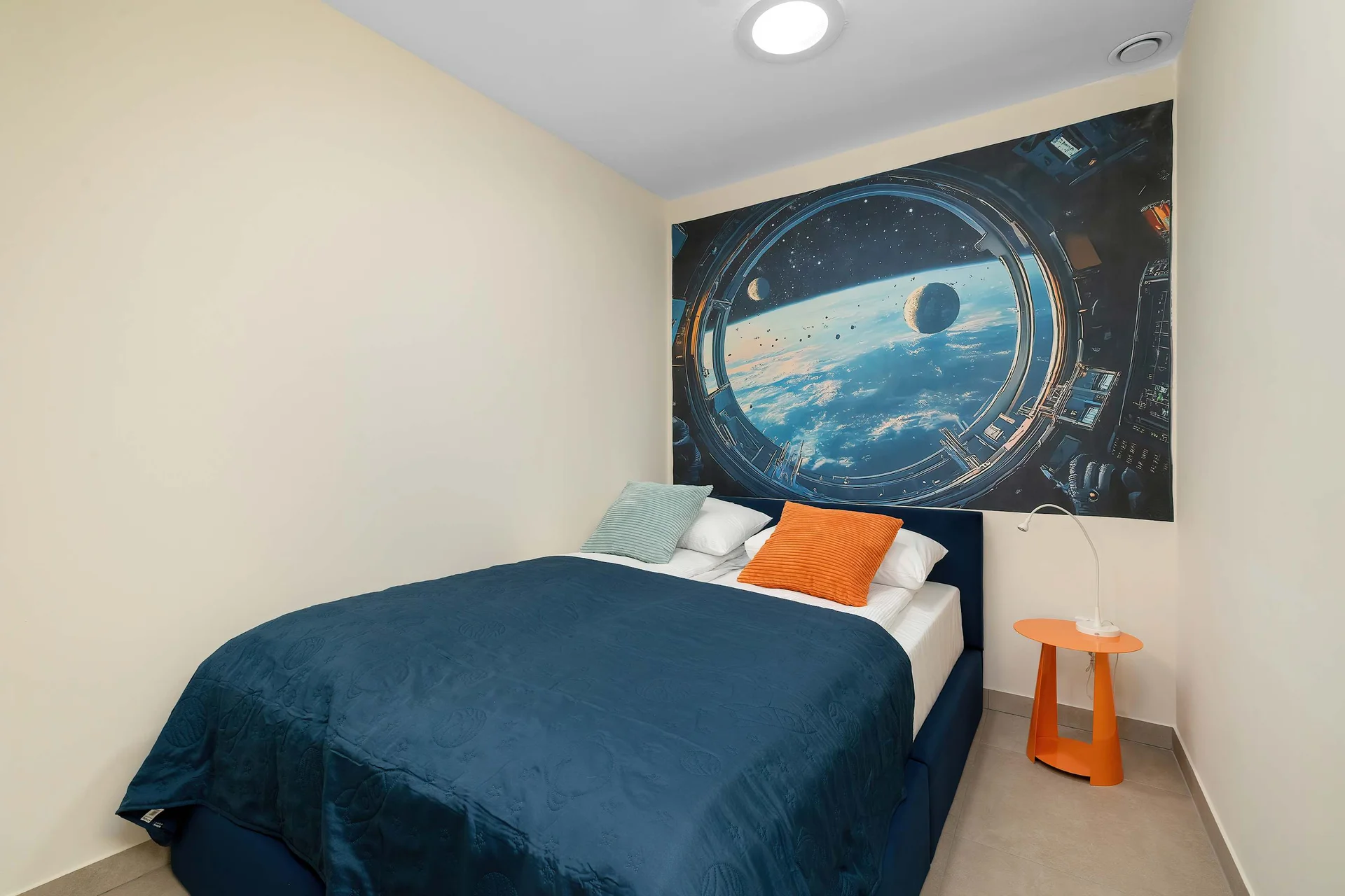 The bedroom's elegant decor creates a serene and restful environment.