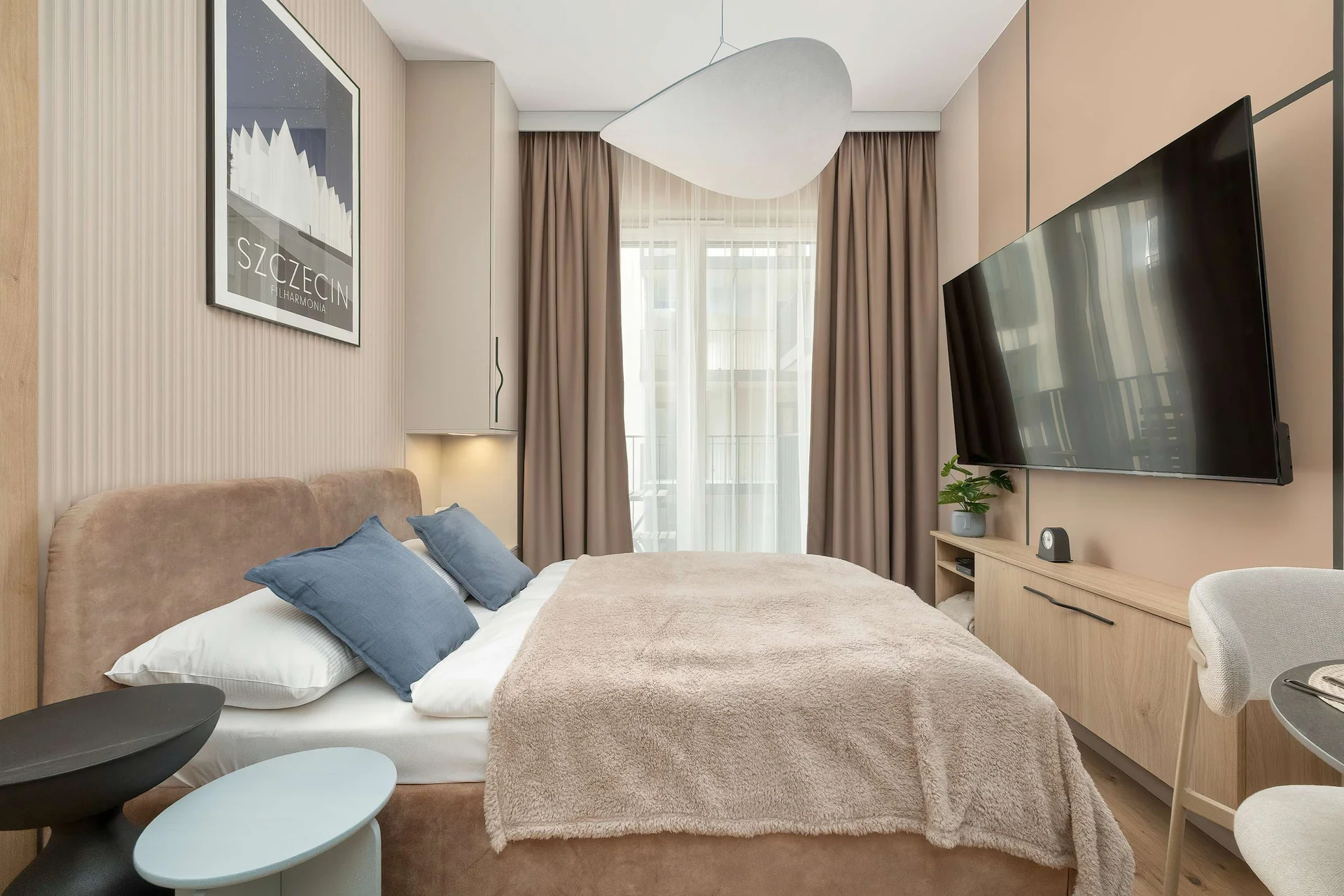 Relax in the stylish living room with a comfortable sofa and modern decor.