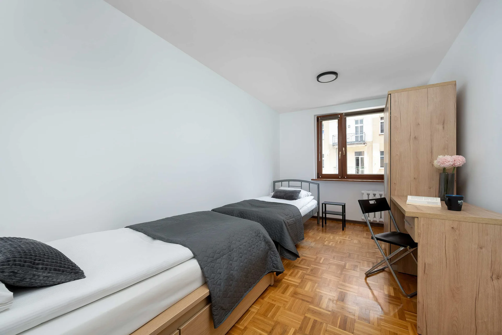 The bedroom's elegant decor creates a serene and restful environment.