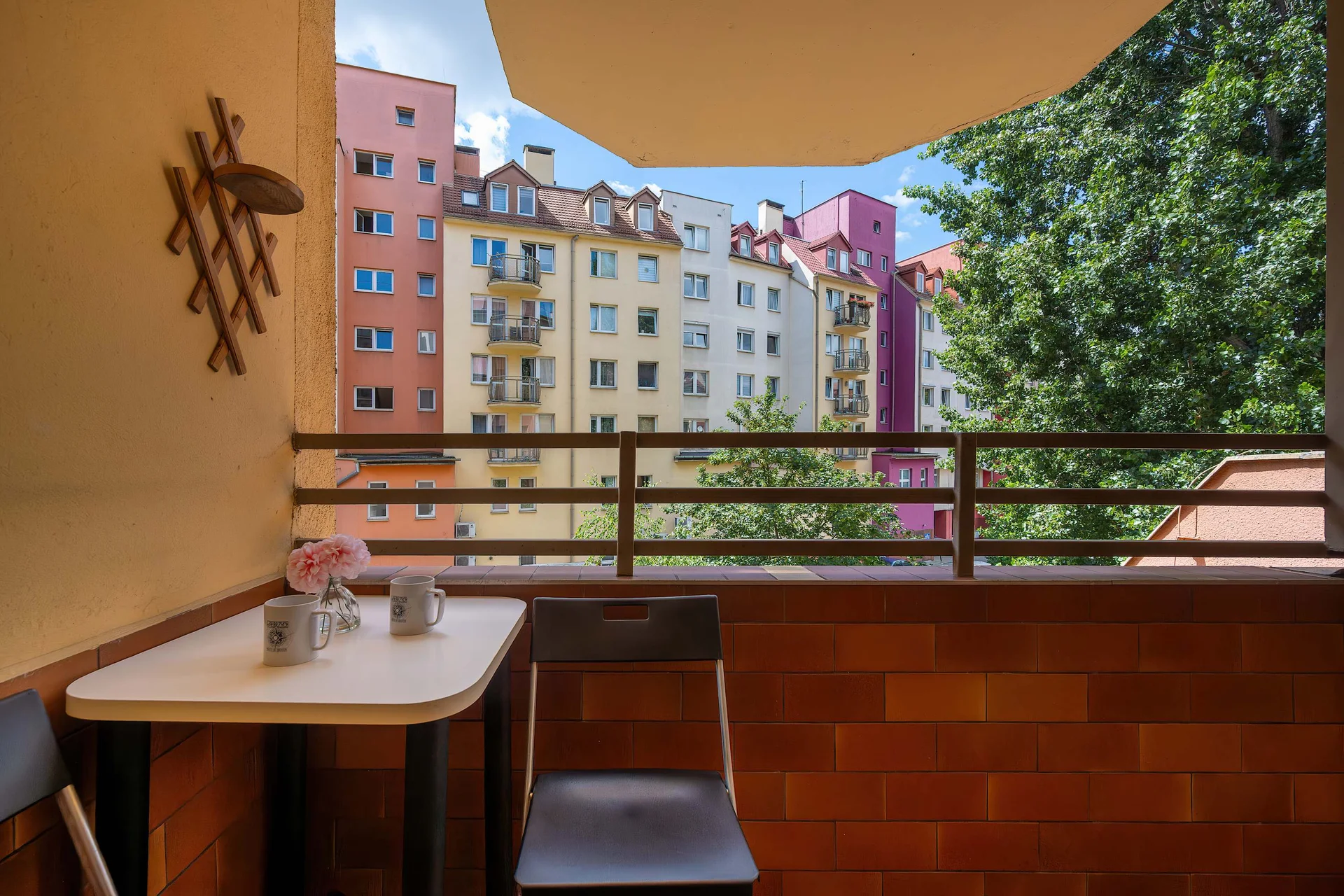 The balcony provides a perfect spot for enjoying the fresh air.