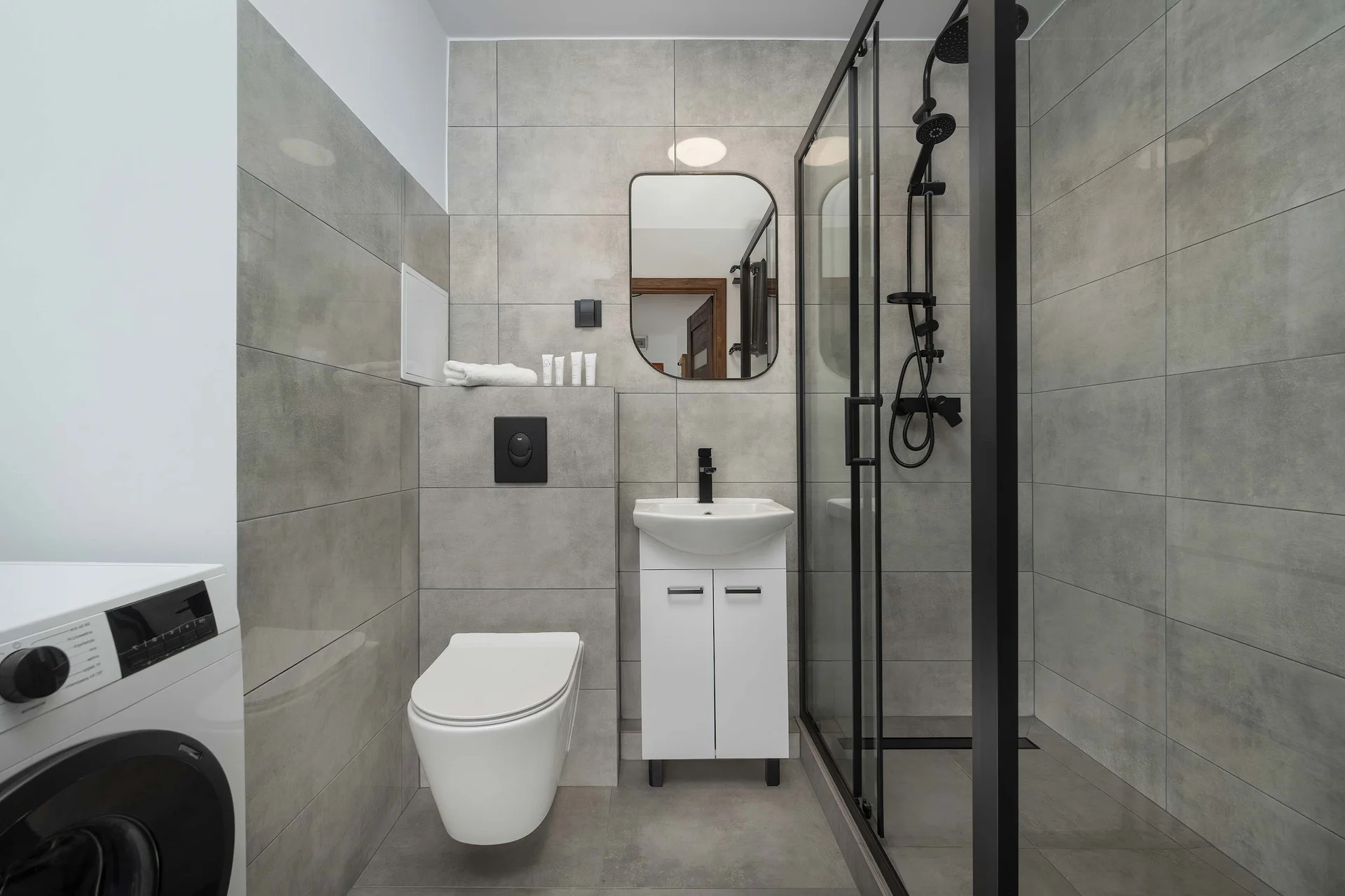 The bathroom offers a clean and functional space for your stay.