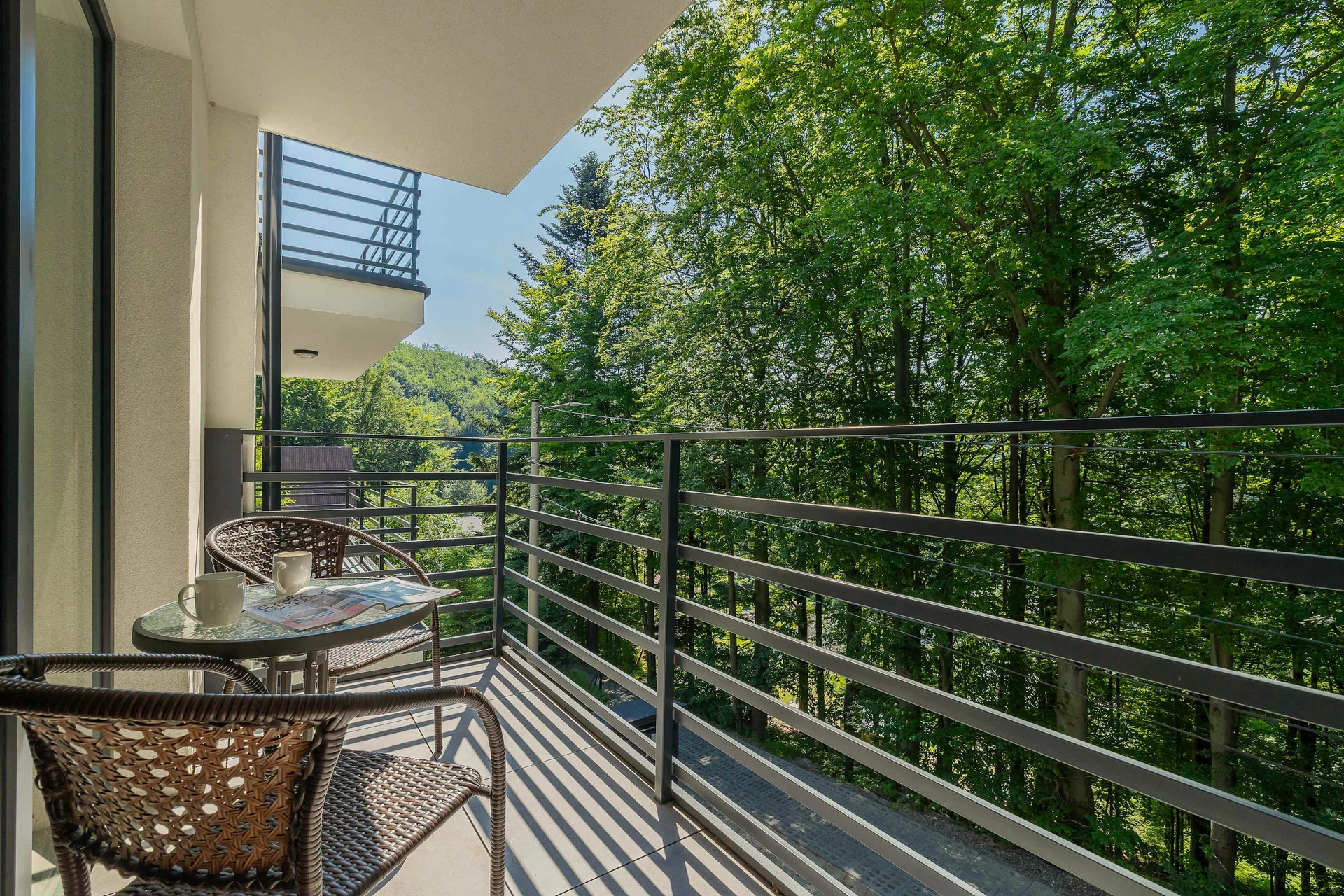 The balcony provides a perfect spot for enjoying the fresh air.