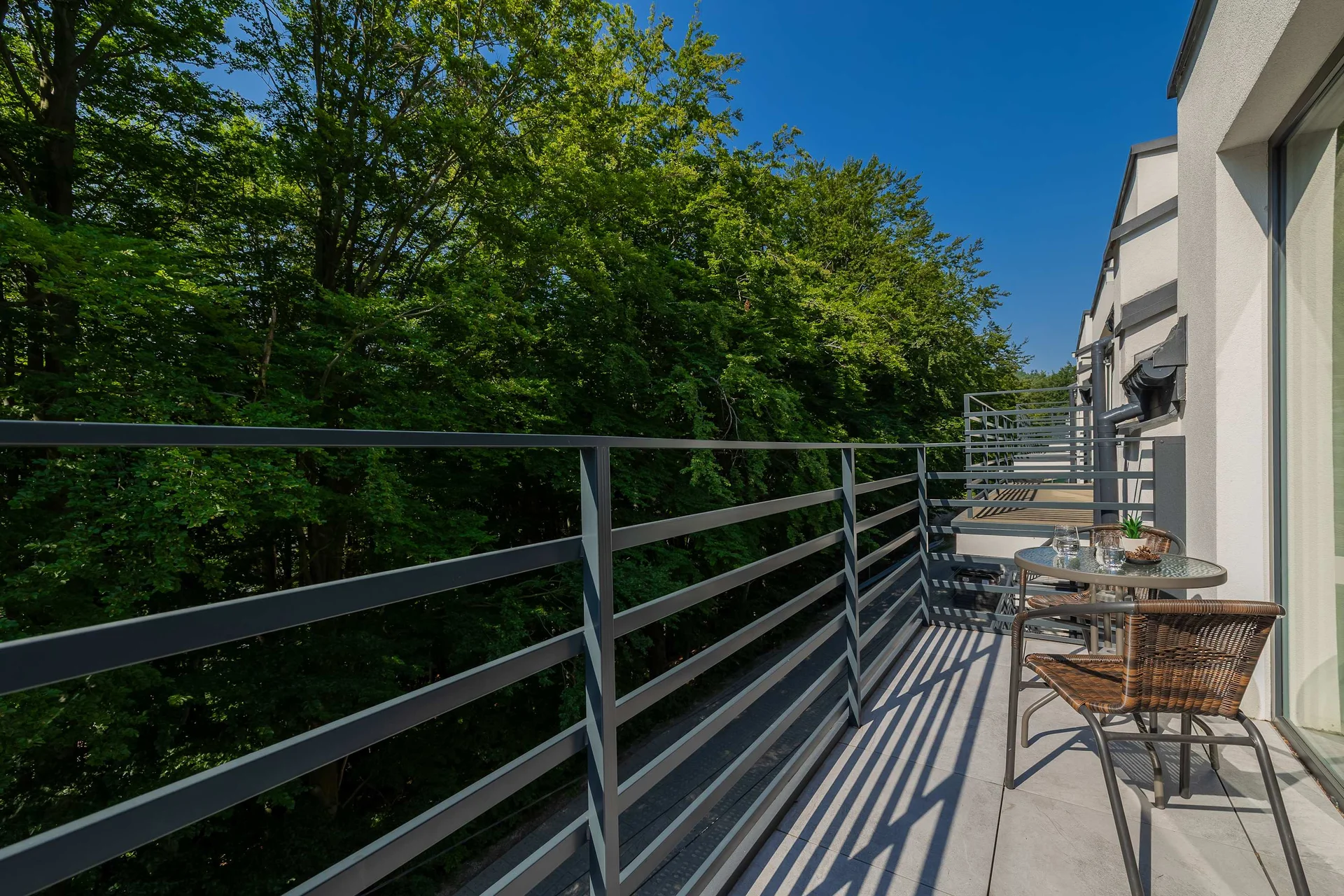 The balcony provides a perfect spot for enjoying the fresh air.