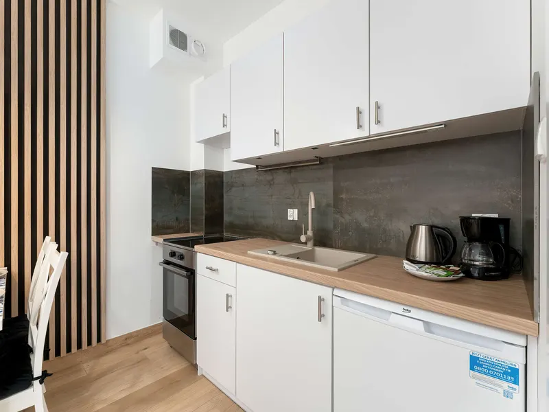 Cozy Studio with a Balcony and Parking yb Noclegi Renters – photo 3