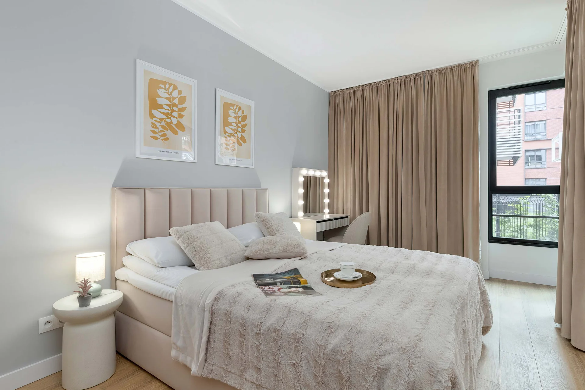 The cosy bedroom features a luxurious double bed and ample storage.