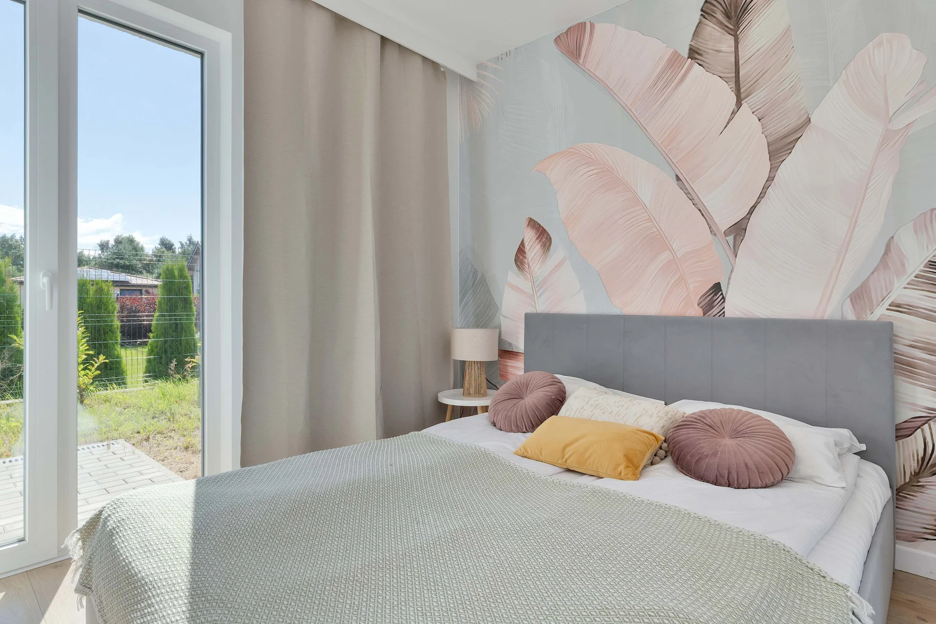 The bedroom's elegant decor creates a serene and restful environment.