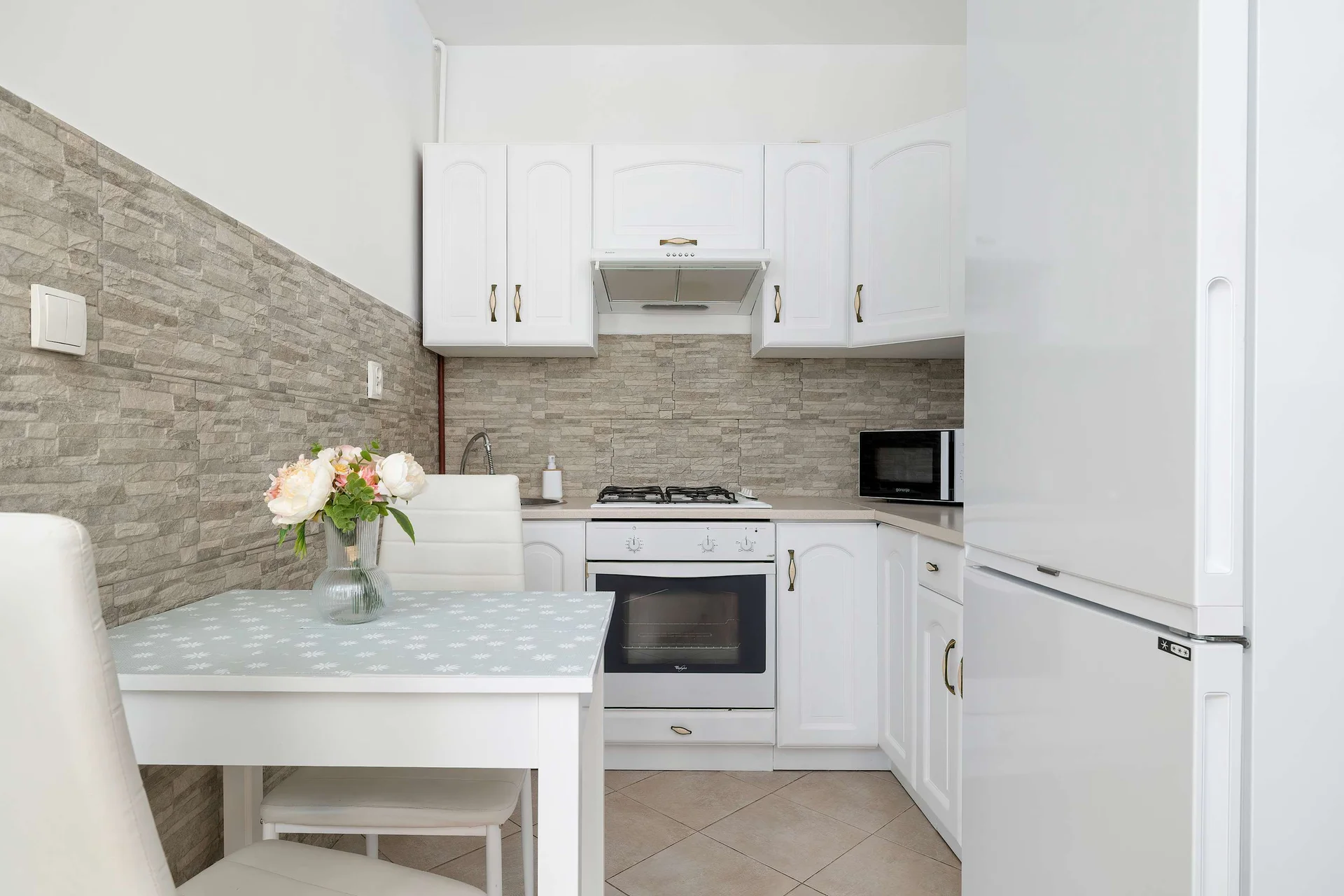 The fully equipped kitchenette includes everything you need for a home-cooked meal.
