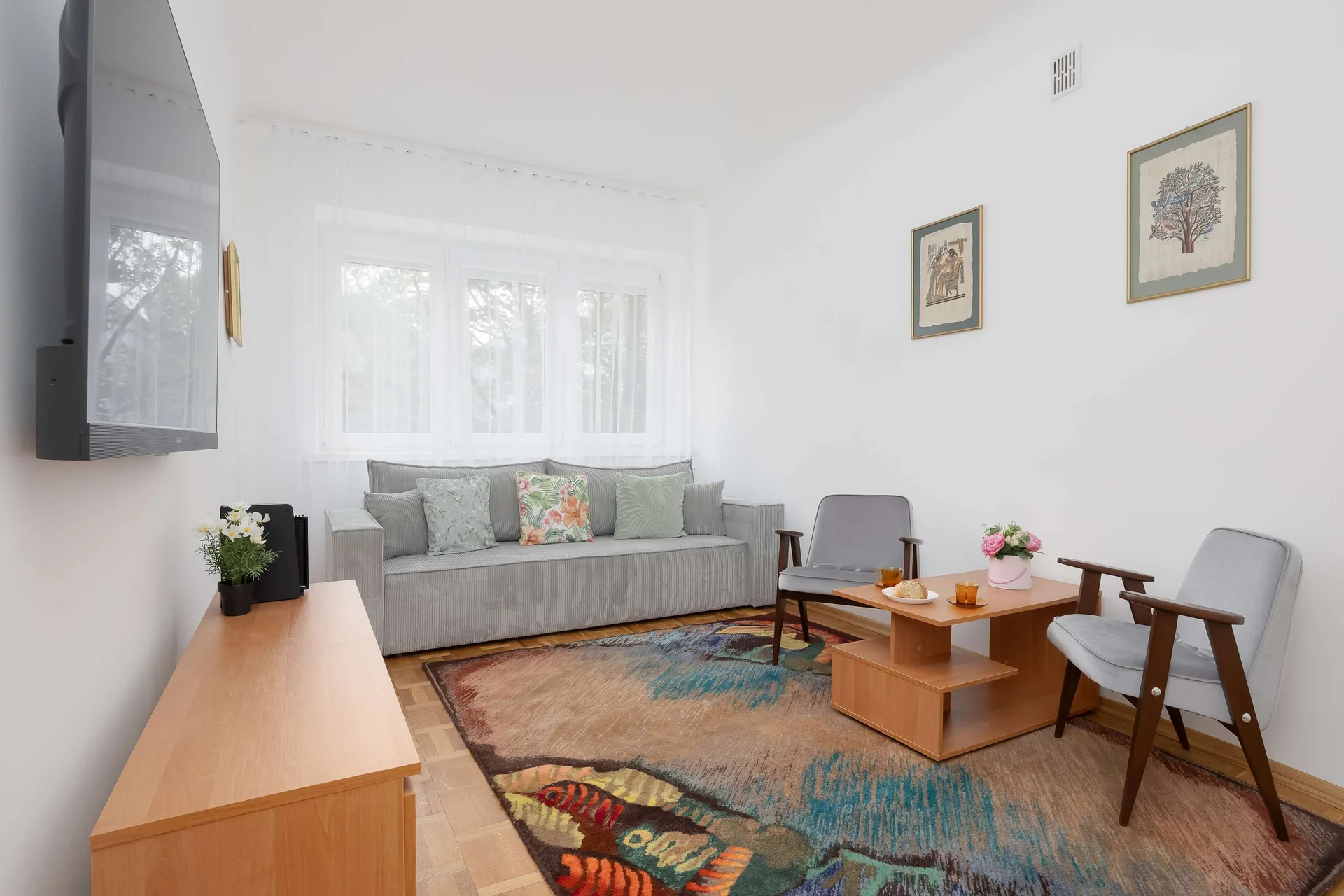 The bedroom's elegant decor creates a serene and restful environment.