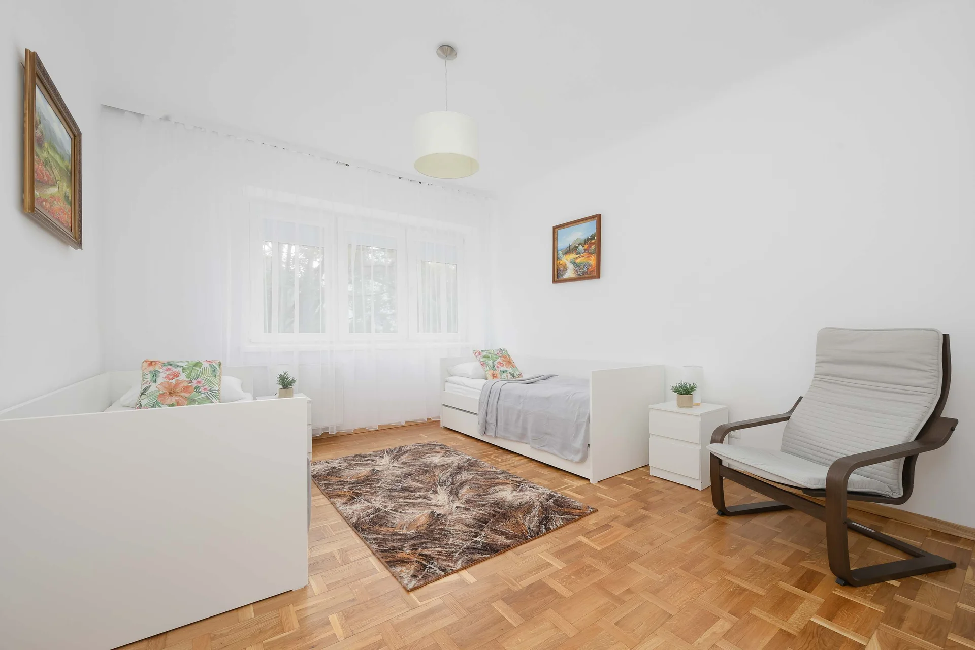 Enjoy the simplicity and comfort of the bedroom's design.