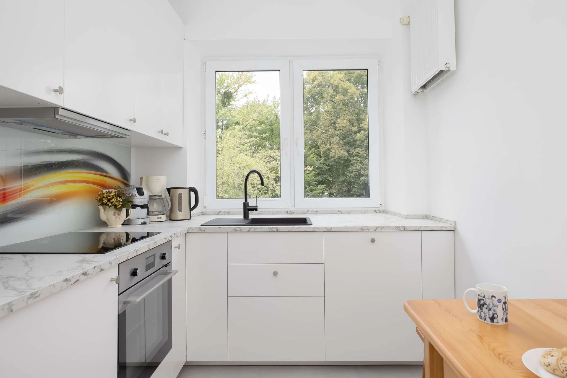 The kitchen's modern appliances make meal preparation easy.