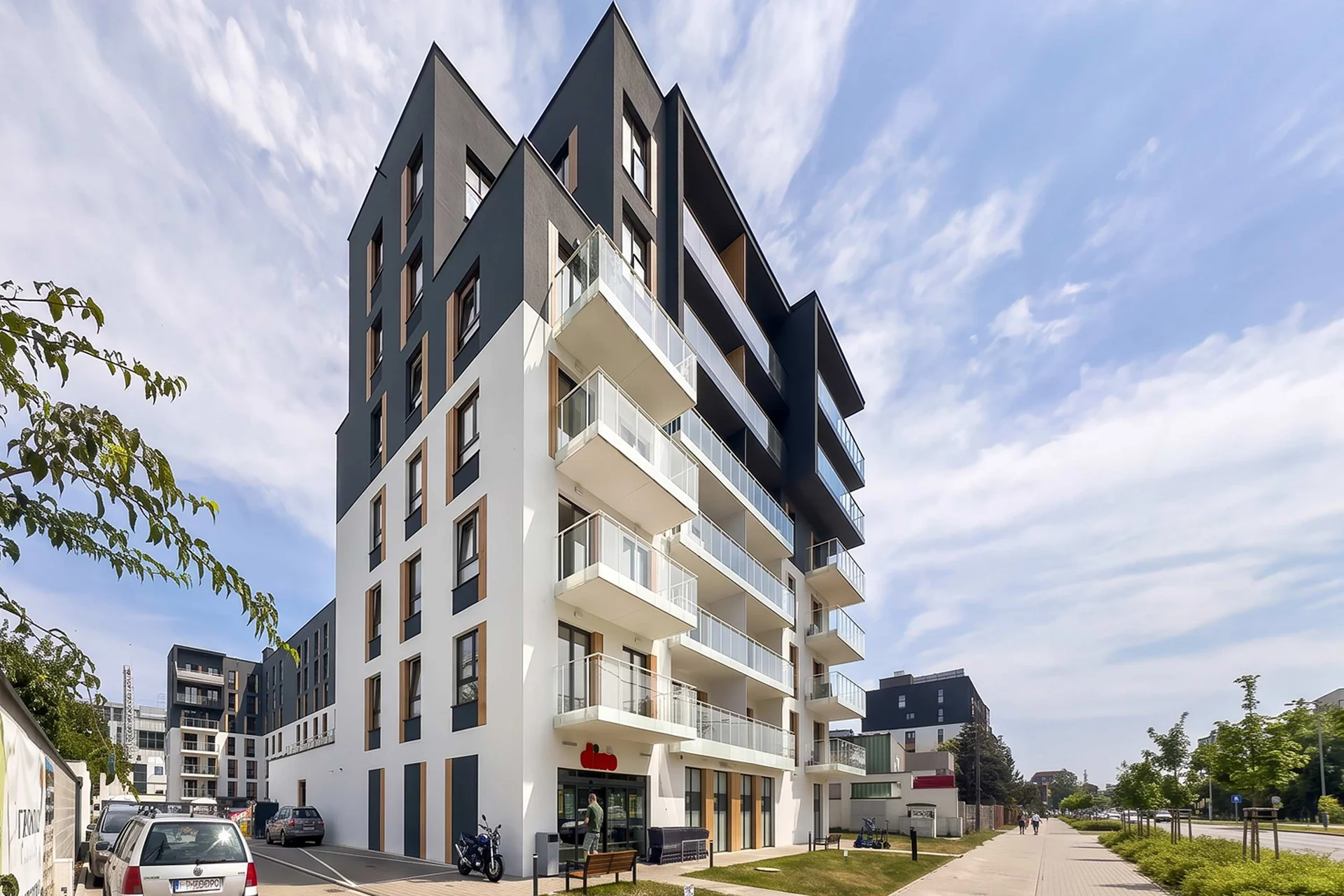 Contemporary apartment building with distinctive architecture and elegant façades.