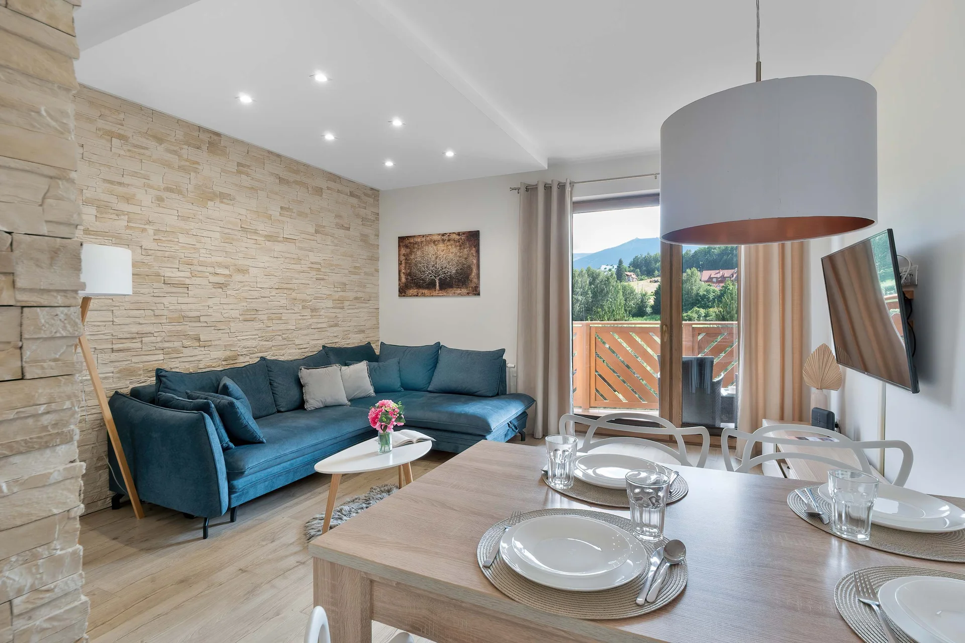 Relax in the stylish living room with a comfortable sofa and modern decor.