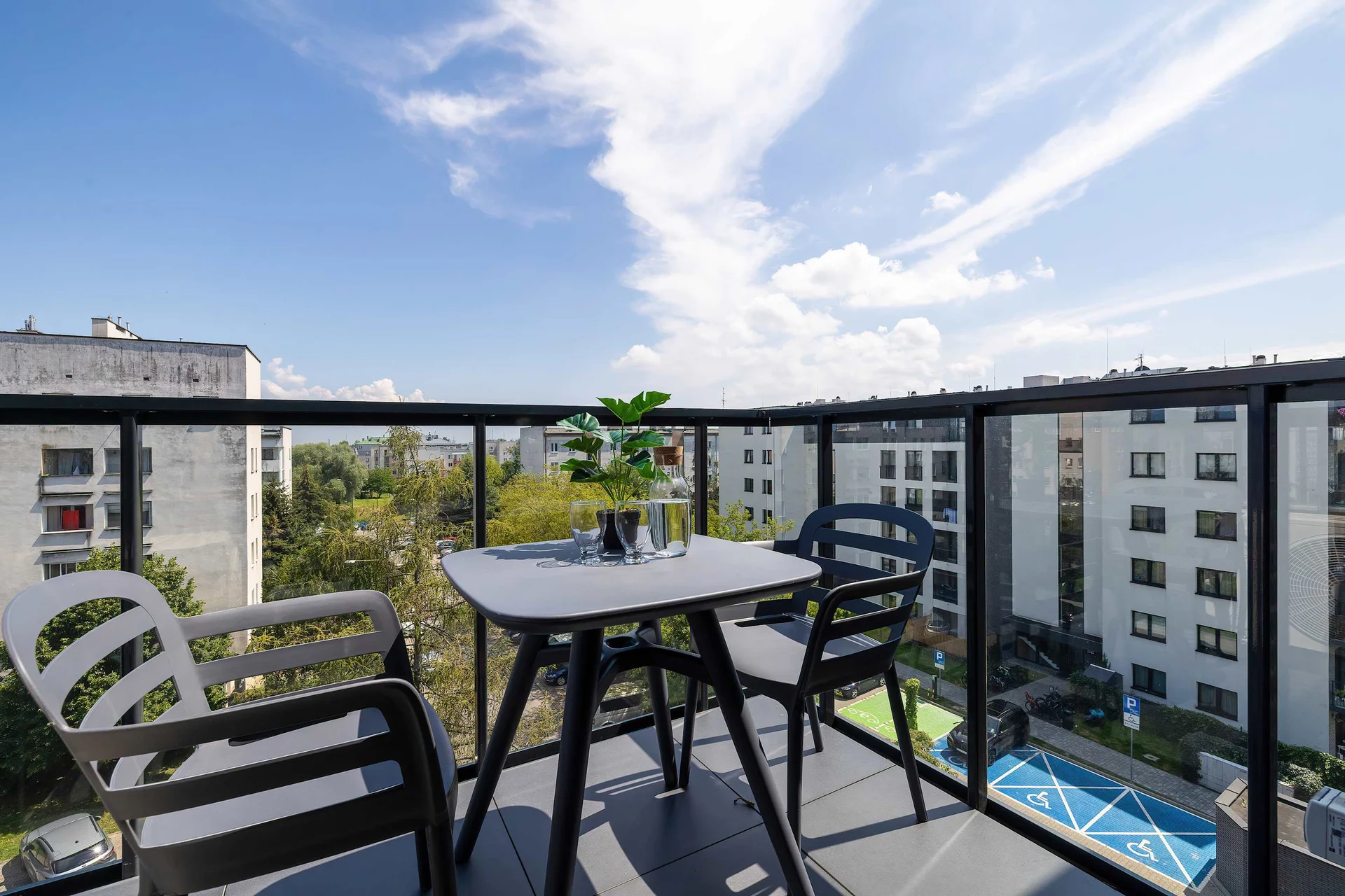 The balcony provides a perfect spot for enjoying the fresh air.