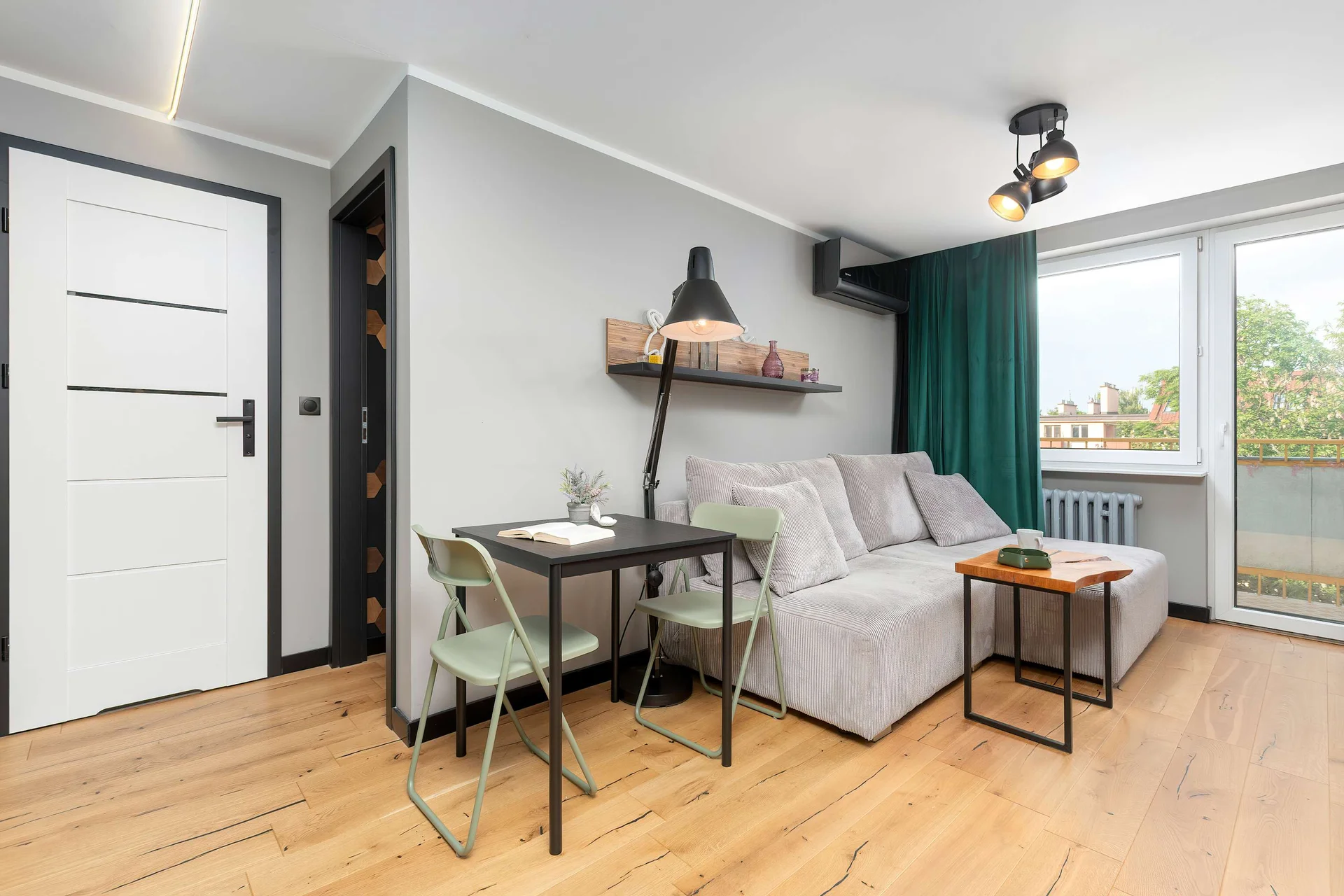 The bedroom's modern design ensures a comfortable stay.