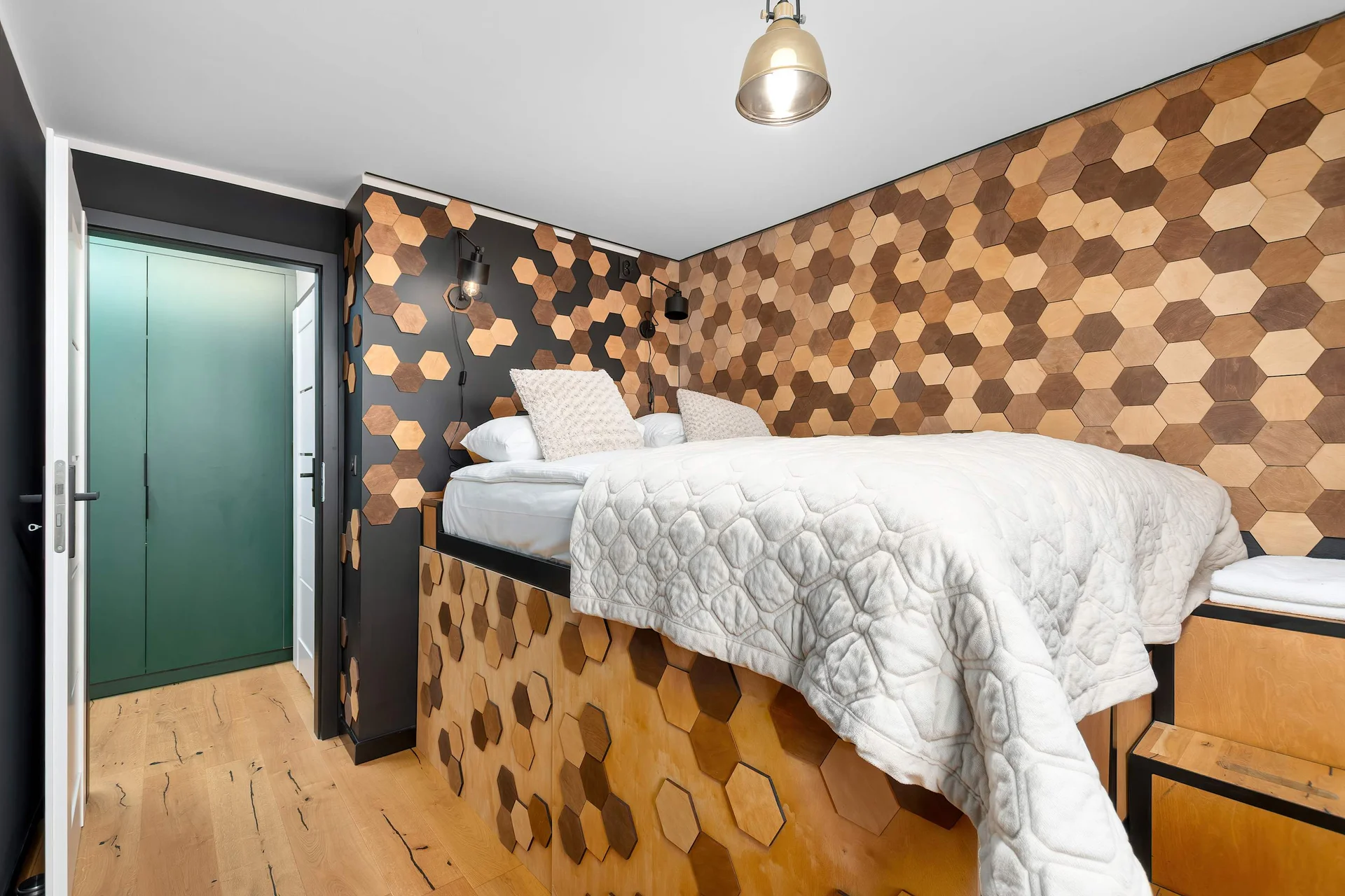 The bedroom's elegant decor creates a serene and restful environment.