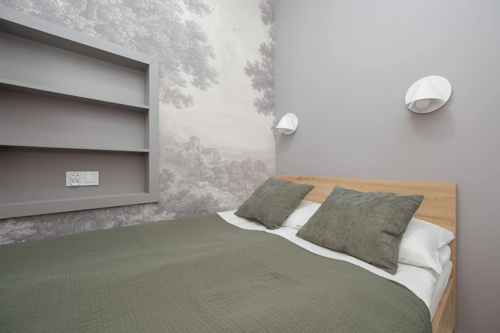 The bedroom's elegant decor creates a serene and restful environment.