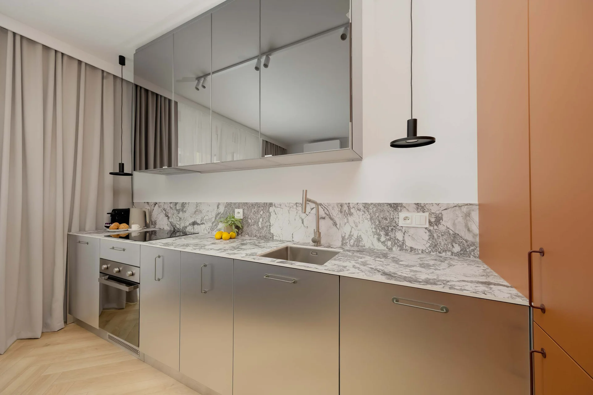 The fully equipped kitchenette includes everything you need for a home-cooked meal.