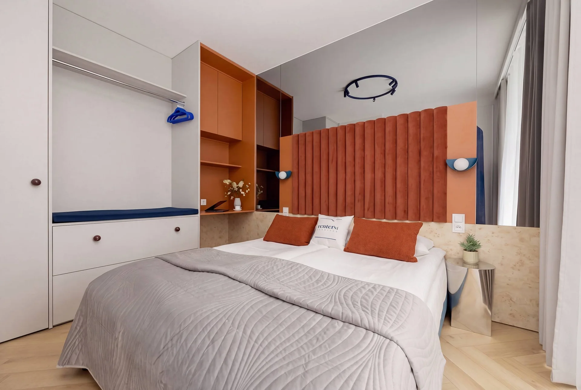 The bedroom's elegant decor creates a serene and restful environment.