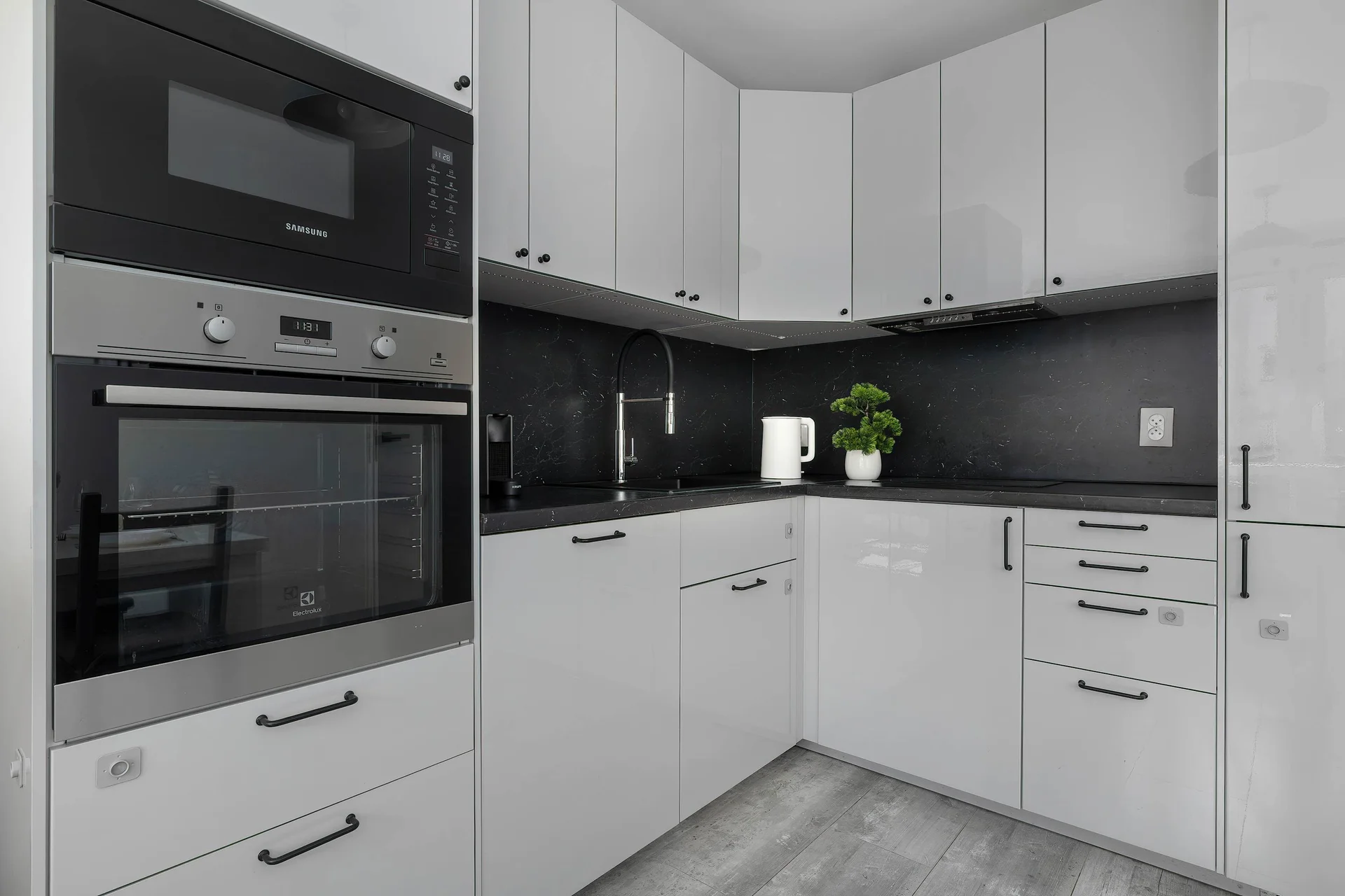 The fully equipped kitchenette includes everything you need for a home-cooked meal.