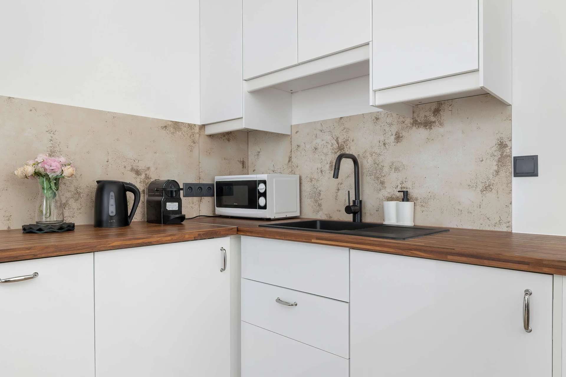 The fully equipped kitchenette includes everything you need for a home-cooked meal.