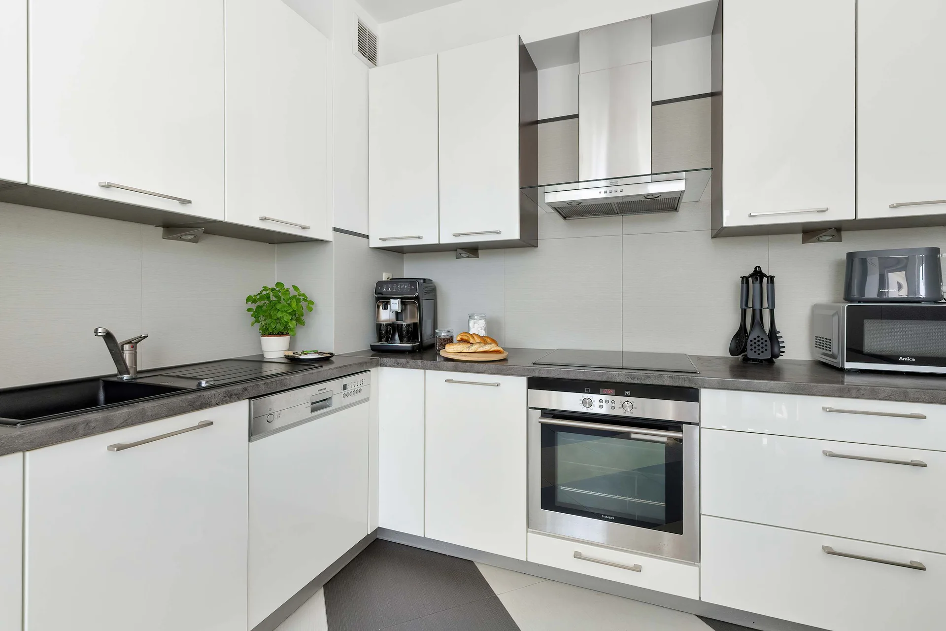 The kitchen's modern appliances make meal preparation easy.