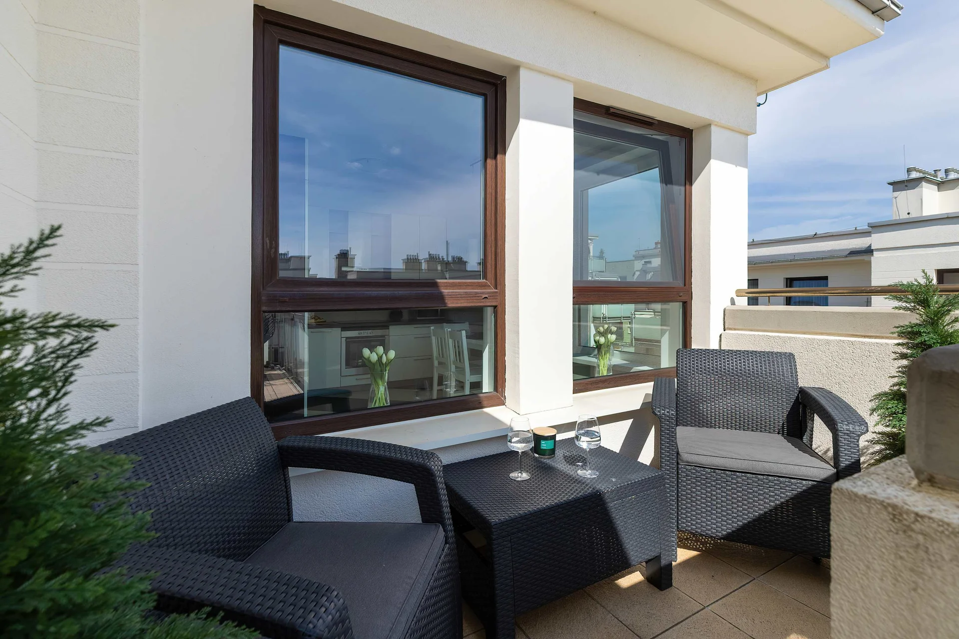 The balcony provides a perfect spot for enjoying the fresh air.