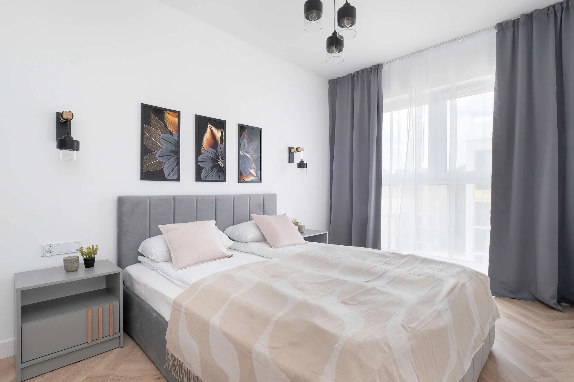 The cosy bedroom features a luxurious double bed and ample storage.
