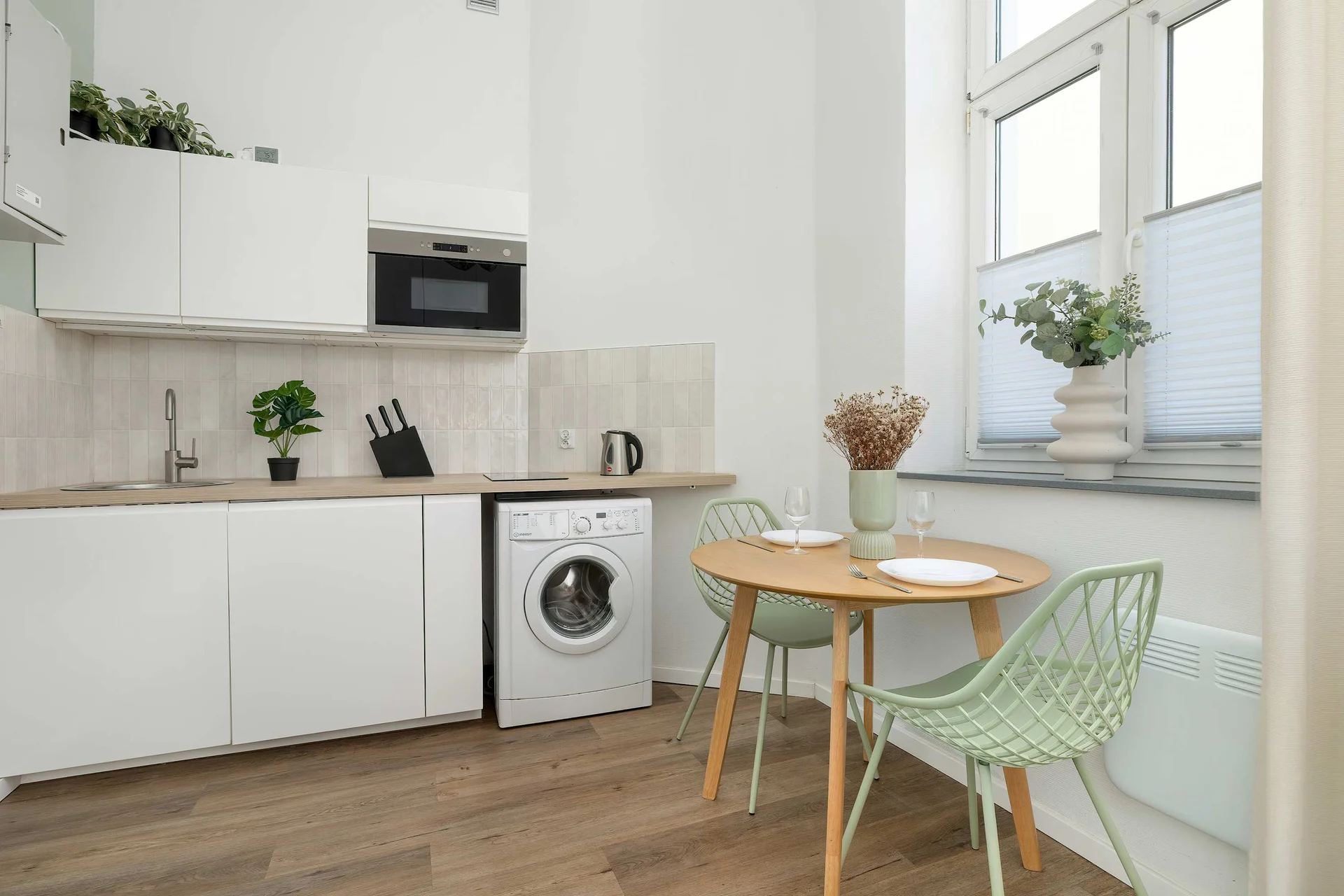 The fully equipped kitchenette includes everything you need for a home-cooked meal.