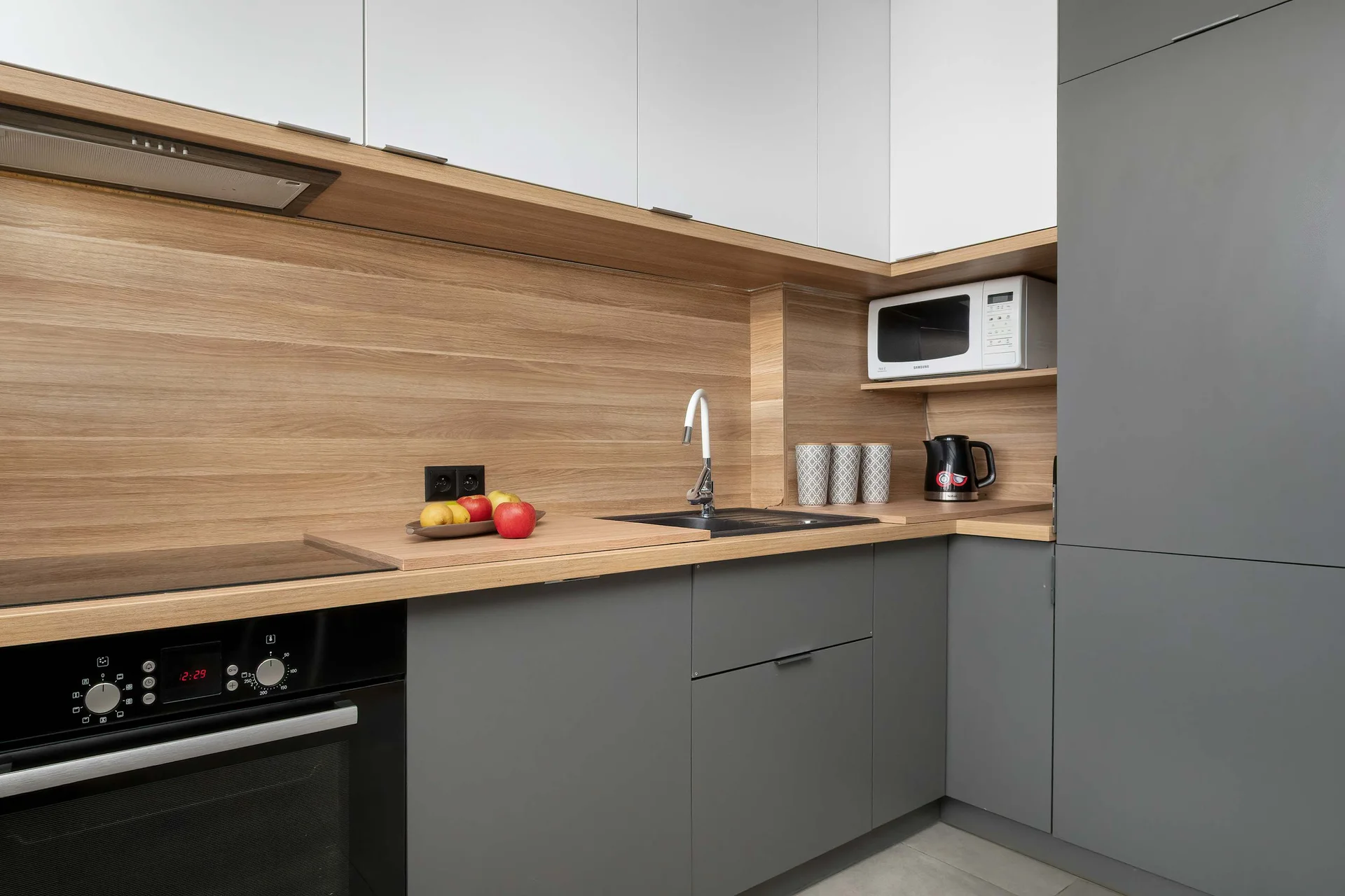 The fully equipped kitchenette includes everything you need for a home-cooked meal.