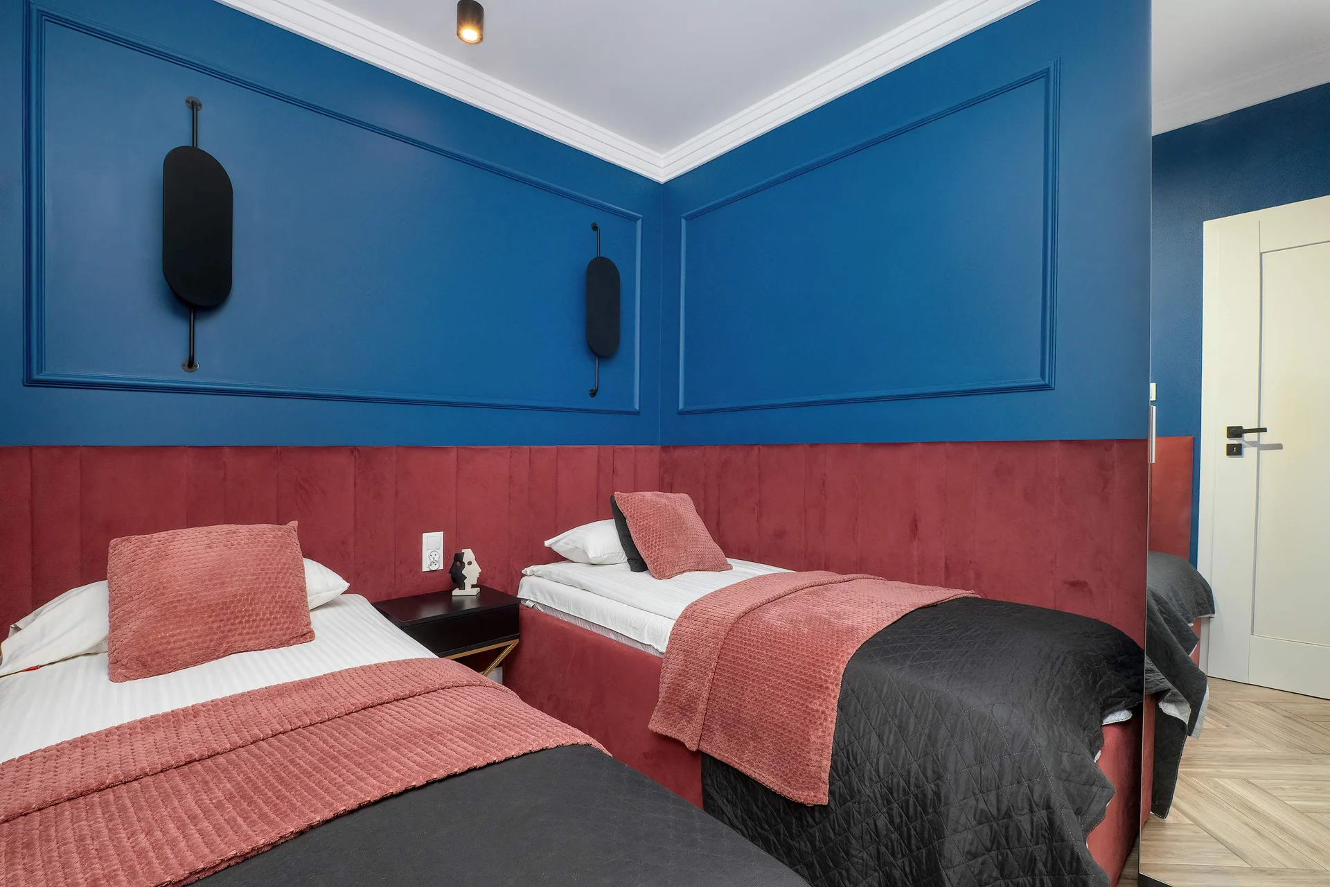 The bedroom's elegant decor creates a serene and restful environment.