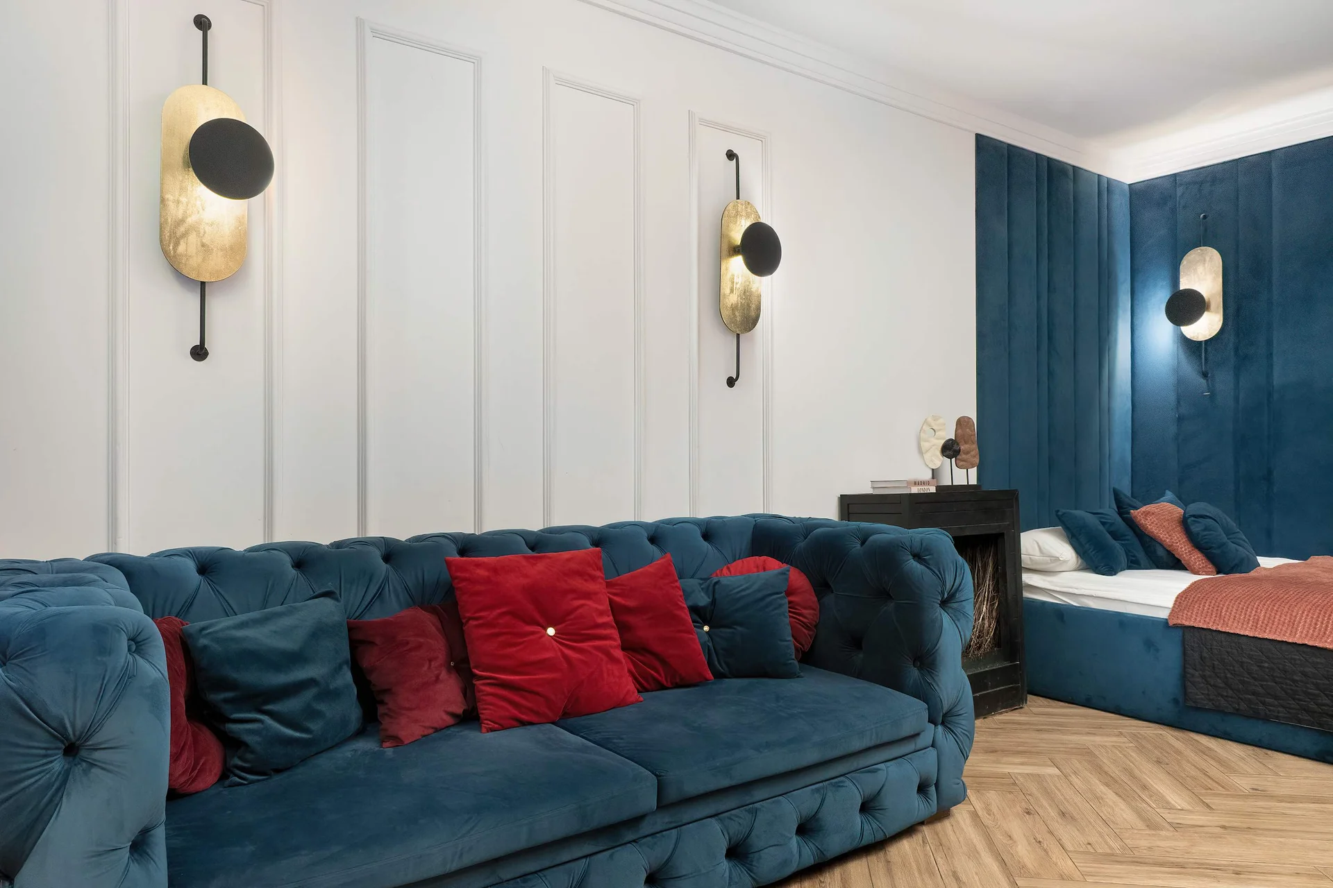 Relax in the stylish living room with a comfortable sofa and elegant decor.