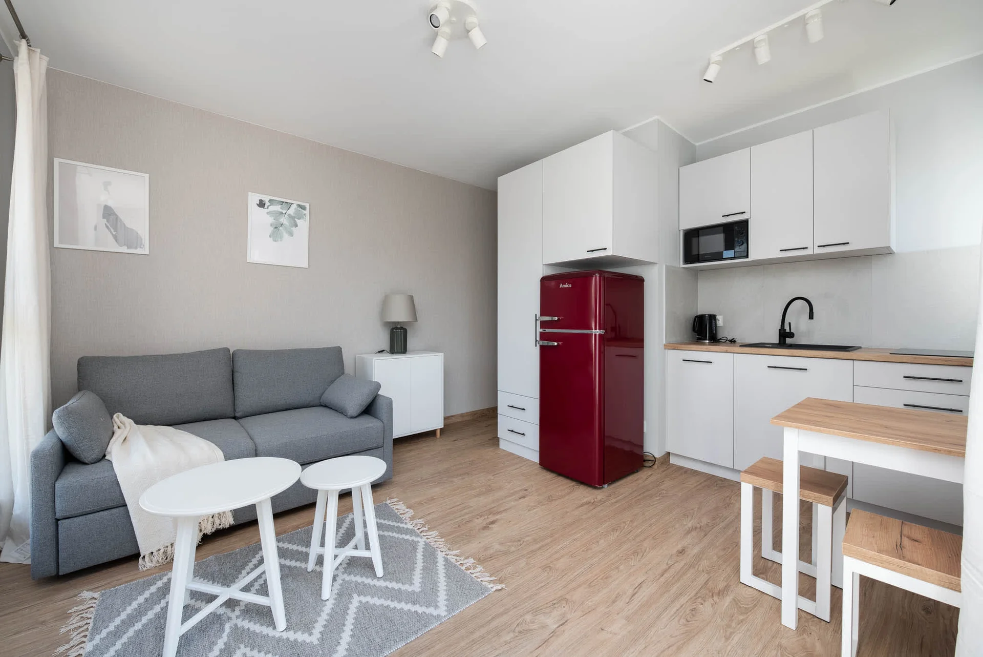 Cosy and elegant living area with double sofa bed.