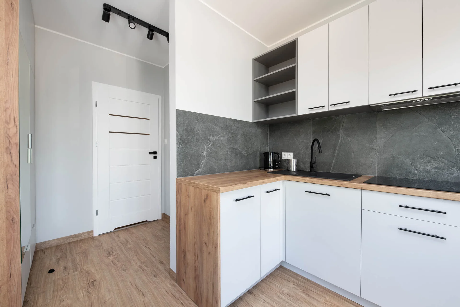 The fully equipped kitchenette includes everything you need for a home-cooked meal.