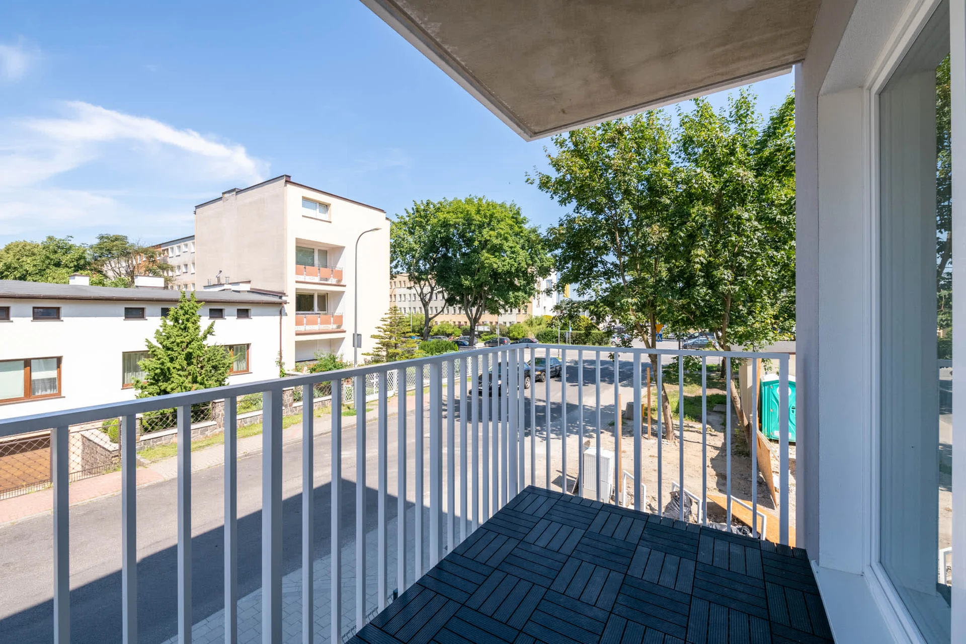 The balcony's stylish design ensures a pleasant stay.