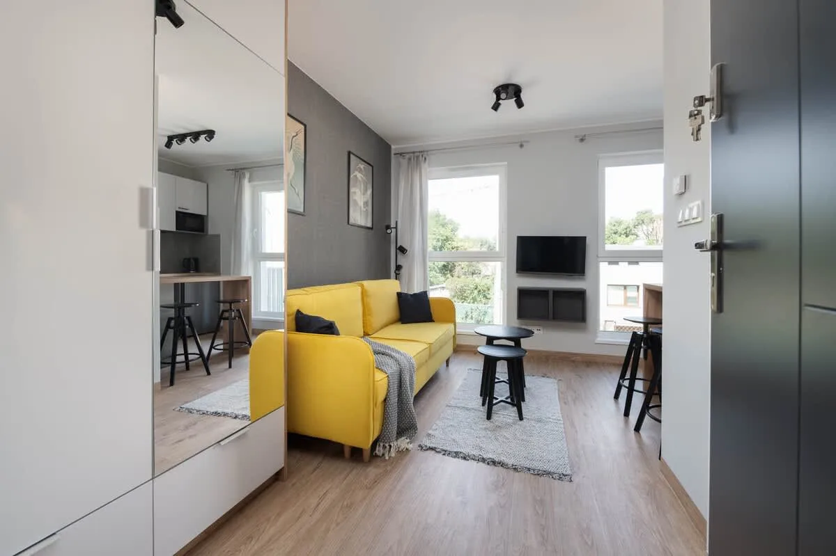 Enjoy your favorite shows on the flat-screen television in the elegant living area.