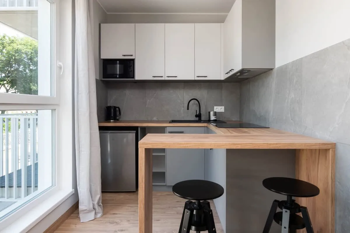 The fully equipped kitchenette includes everything you need for a home-cooked meal.