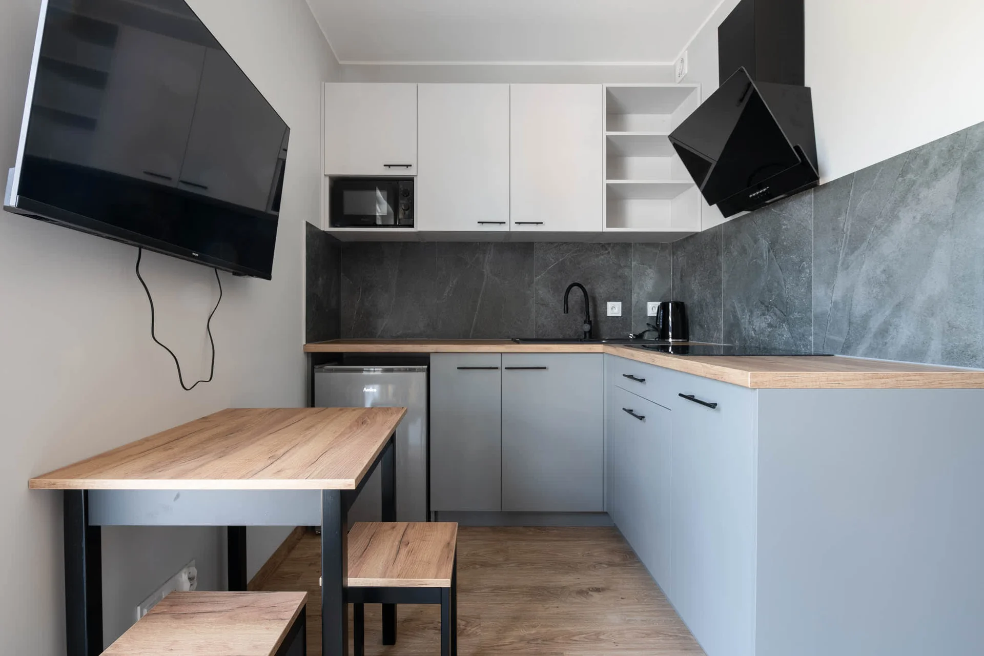 The fully equipped kitchenette includes everything you need for a home-cooked meal.