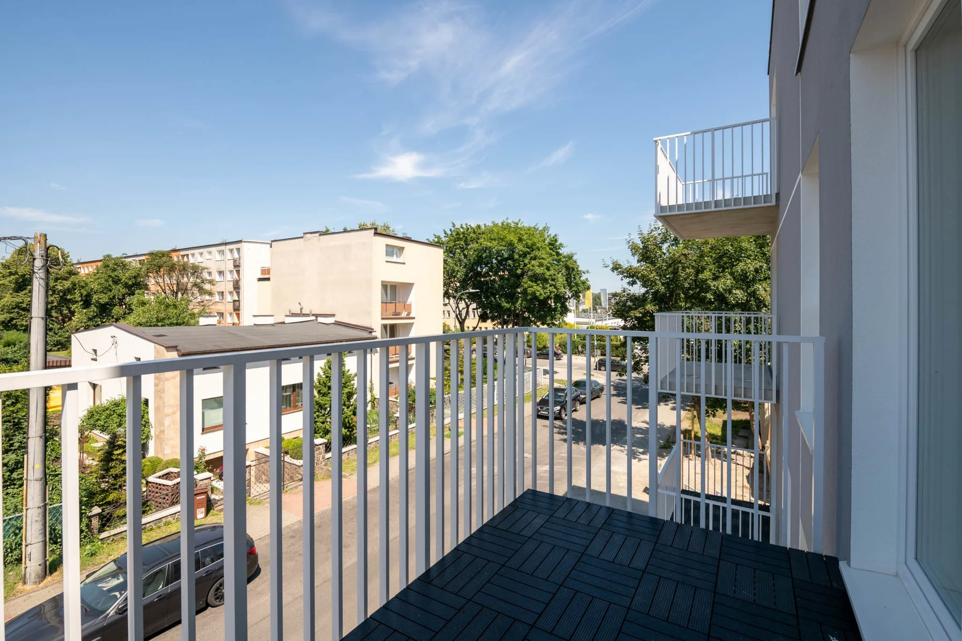 The balcony's stylish design ensures a pleasant stay.