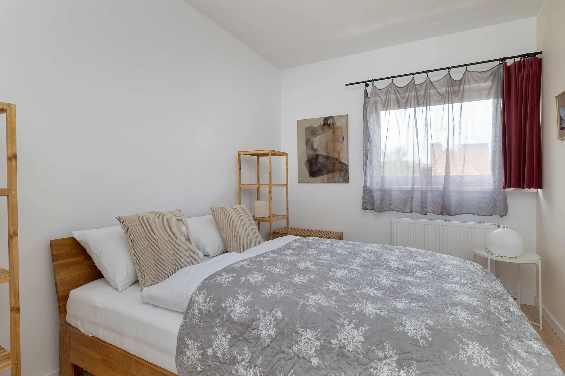 Inviting bedroom with a double bed and plenty of natural light.