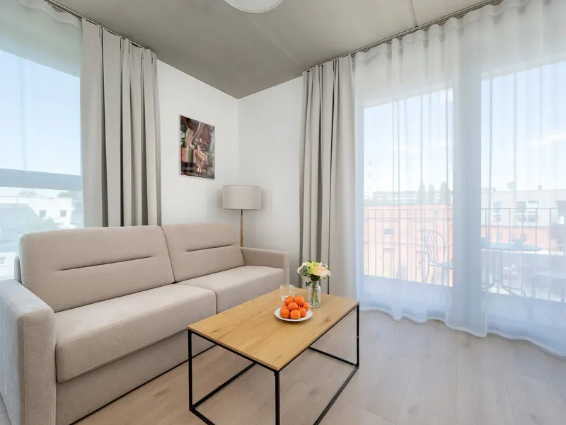 Nowoczesny Apartament w Centrum | Balkon, Parking, Klimatyzacja – zdjęcie 1