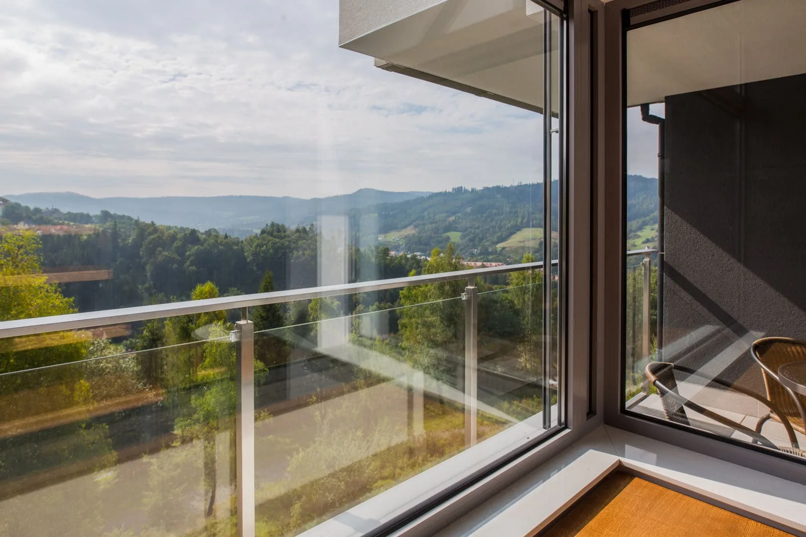 The panorama from the balcony allows you to admire the beauty of the mountains and green valleys, giving a sense of closeness to nature.