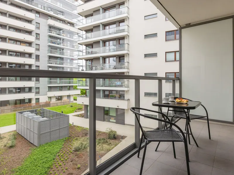 Modern Studio in Warsaw | Balcony and Workspace – photo 3